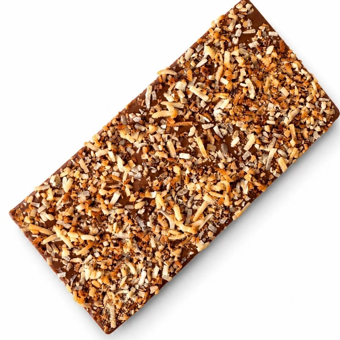 Milk chocolate rectangular bar covered with toasted coconut