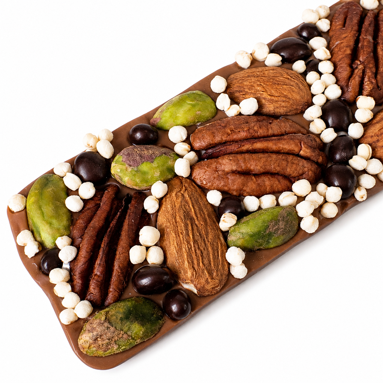 Small handcrafted Belgian milk chocolate bark topped with whole pecans, whole almonds, pistachios, dark chocolate covered cacao nibs, puffed quinoa and golden sparkles