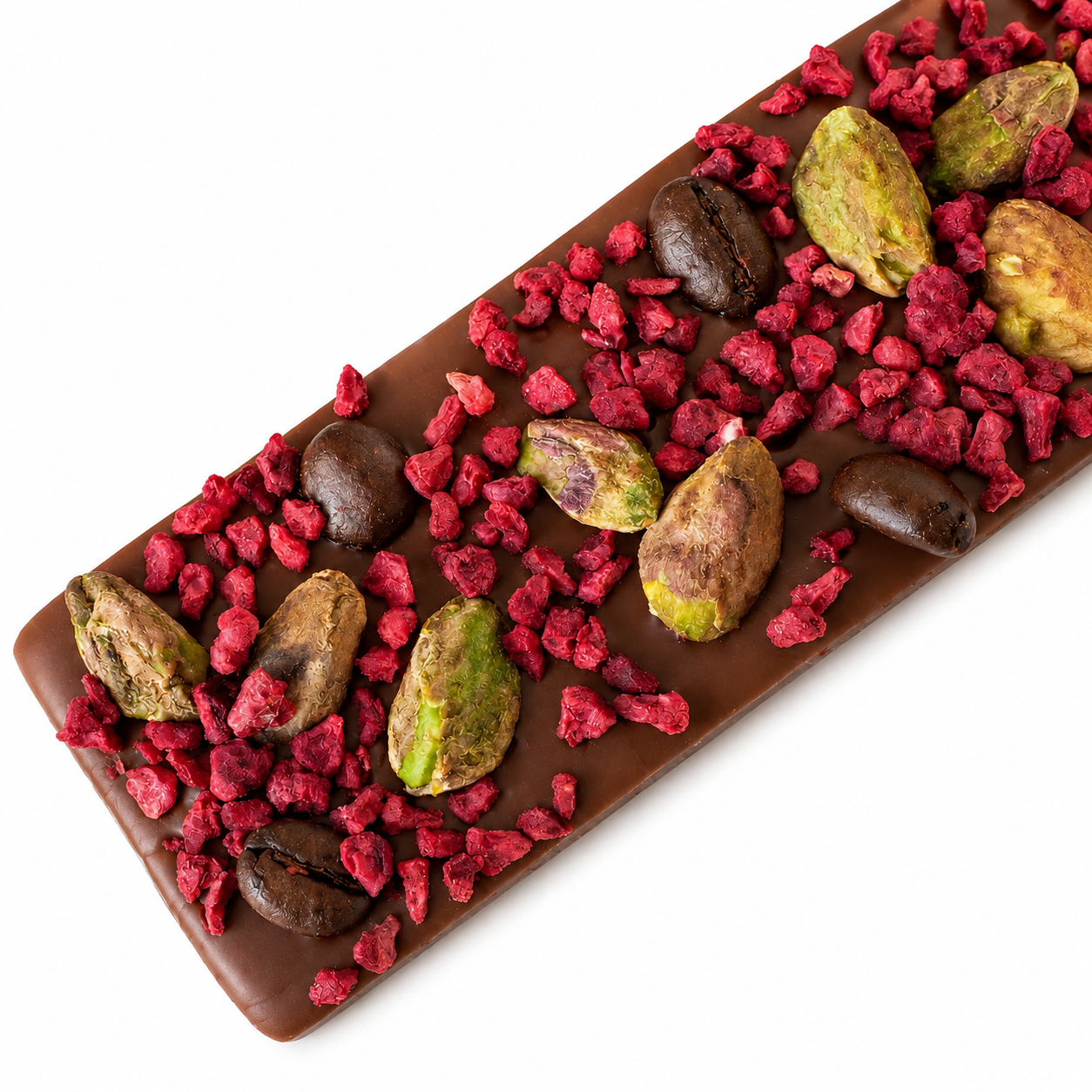 Small handcrafted Belgian milk chocolate bark topped with freeze-dried raspberry crumble, pistachios, and dark chocolate covered cacao nibs.