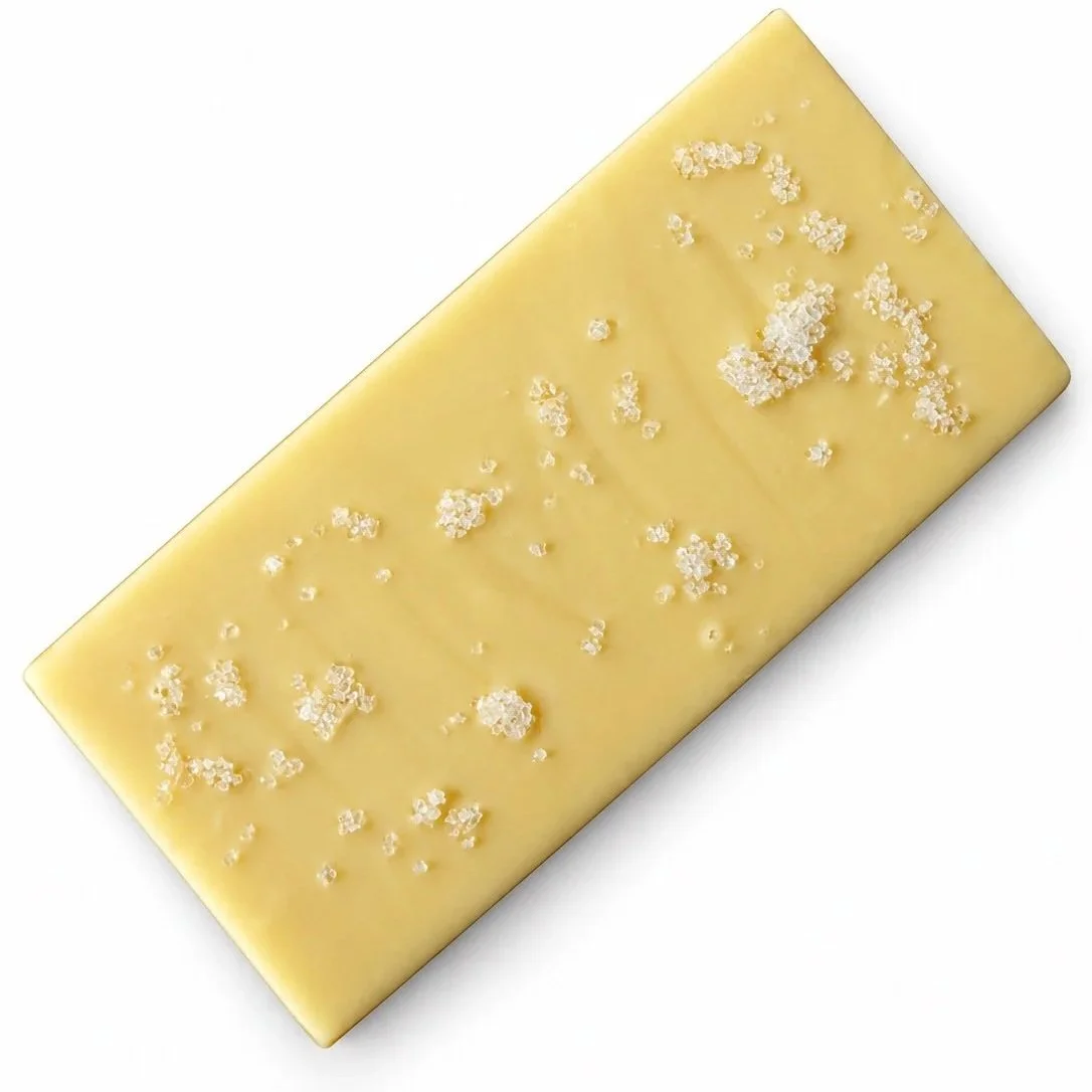 White chocolate rectangular bar finished with sea salt flakes.