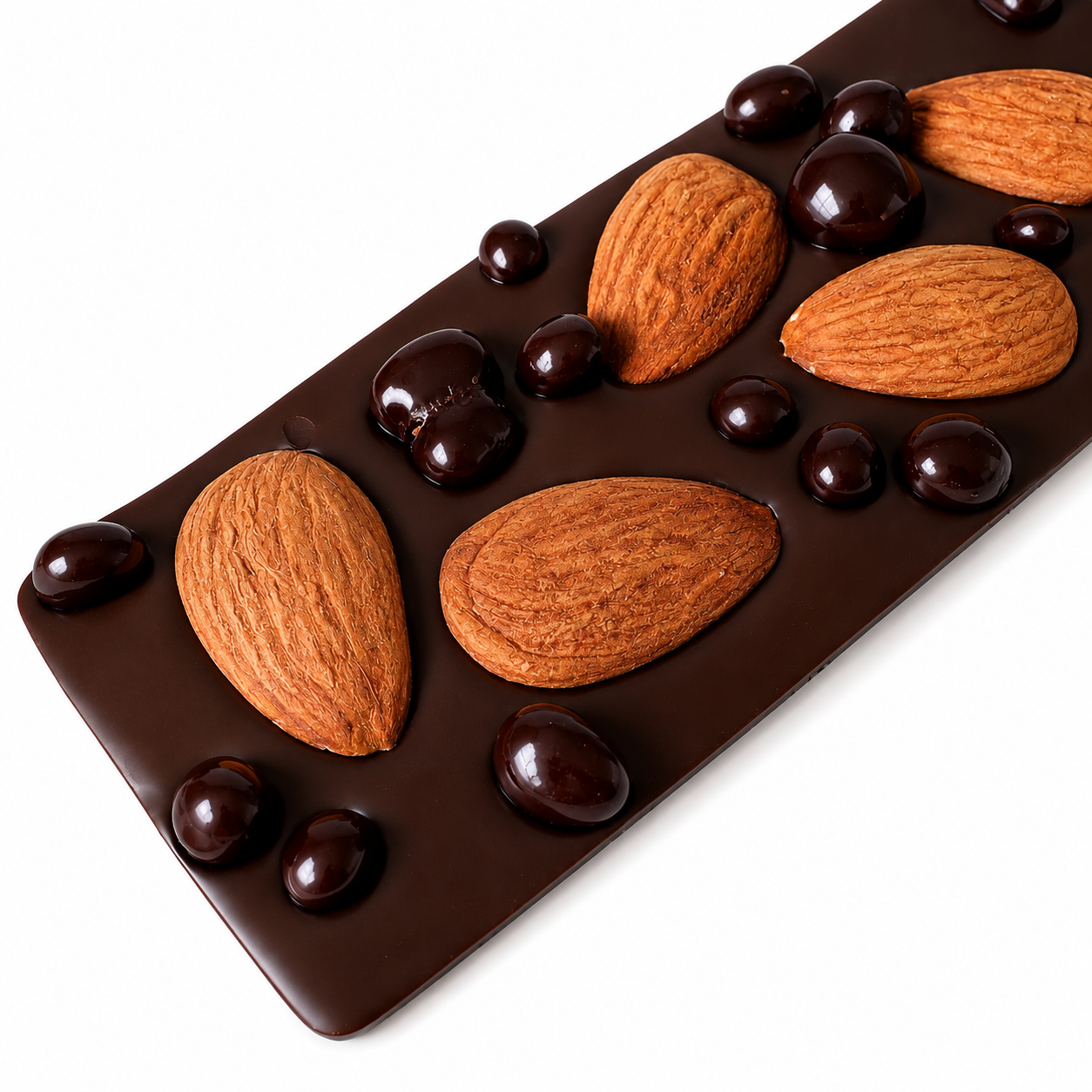 Small handcrafted Belgian dark chocolate bark topped with whole almonds, dark chocolate organic cacoa nibs, and gold sparkles