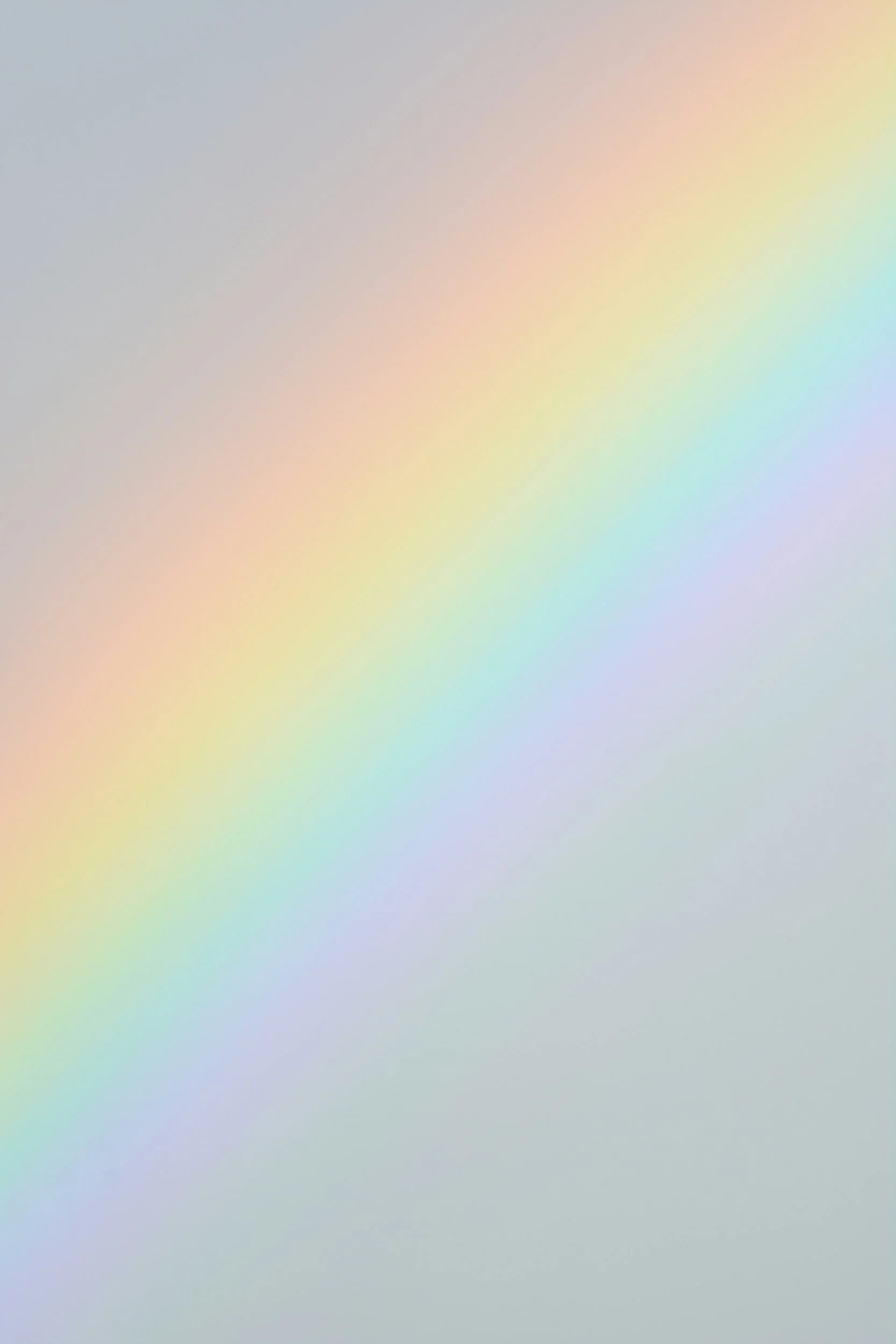 Soft pastel rainbow gradient with subtle blending of colors.