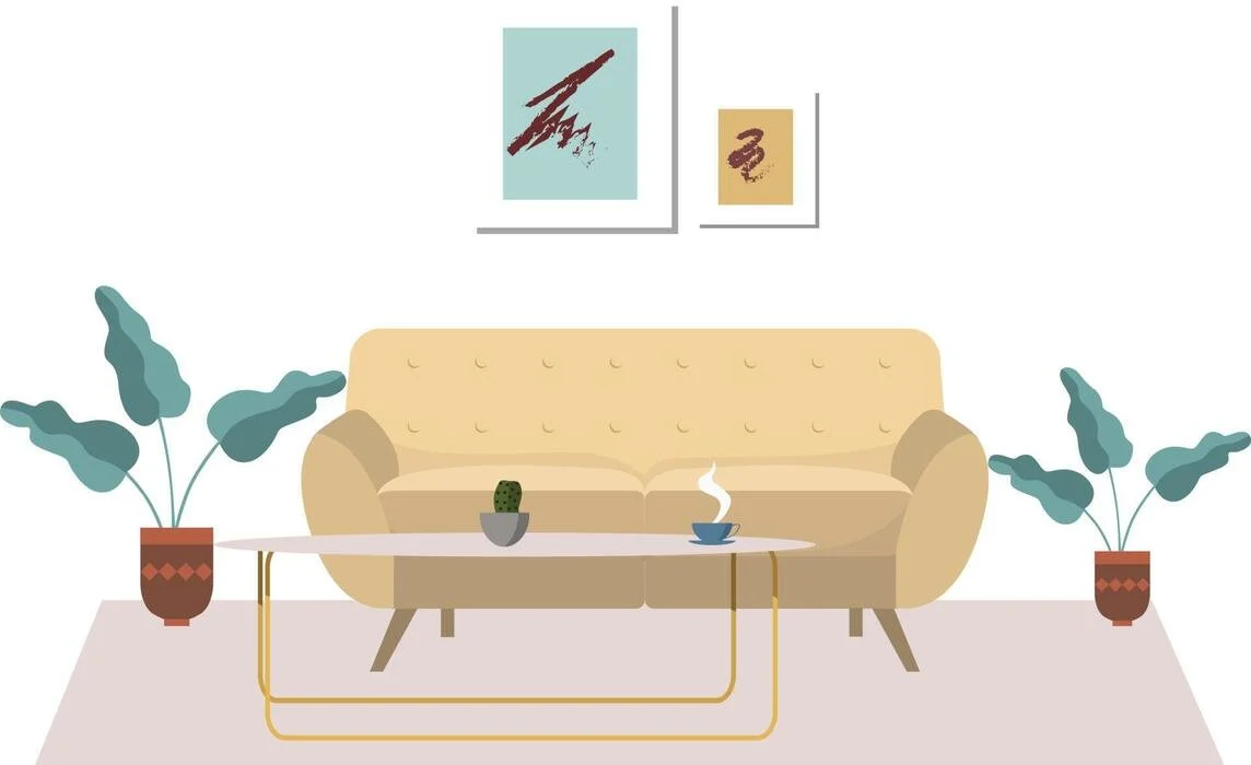 Living room with a beige sofa, two potted plants, a coffee table with a small cactus and a steaming cup, and framed abstract art on the wall.