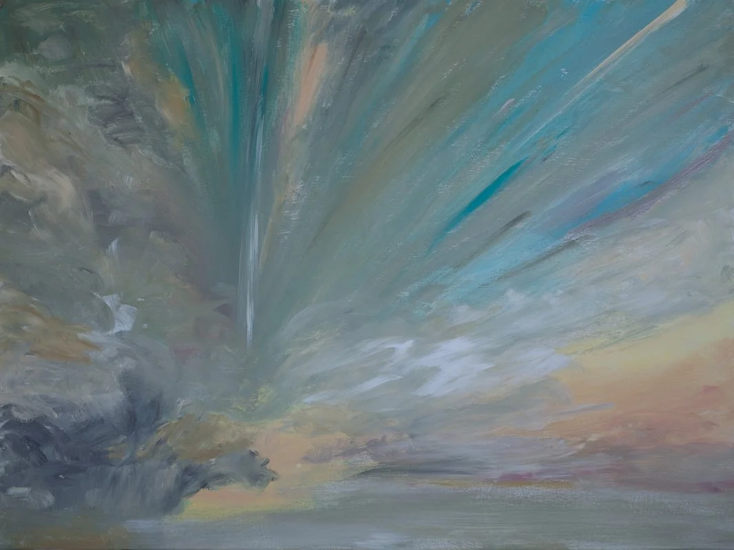Abstract sky scene with clouds, light rays, and a rainbow