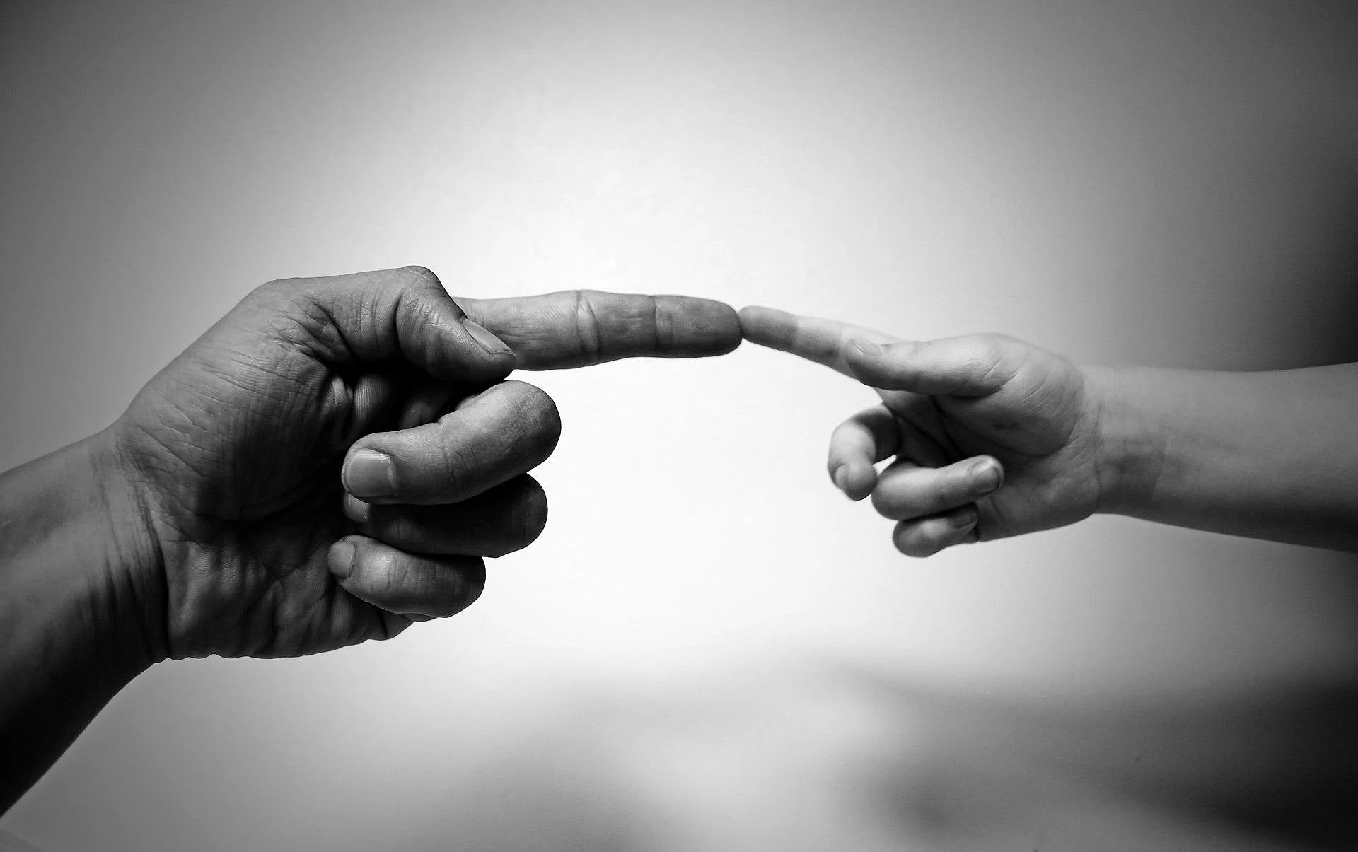 Two people coming together to form a bond.