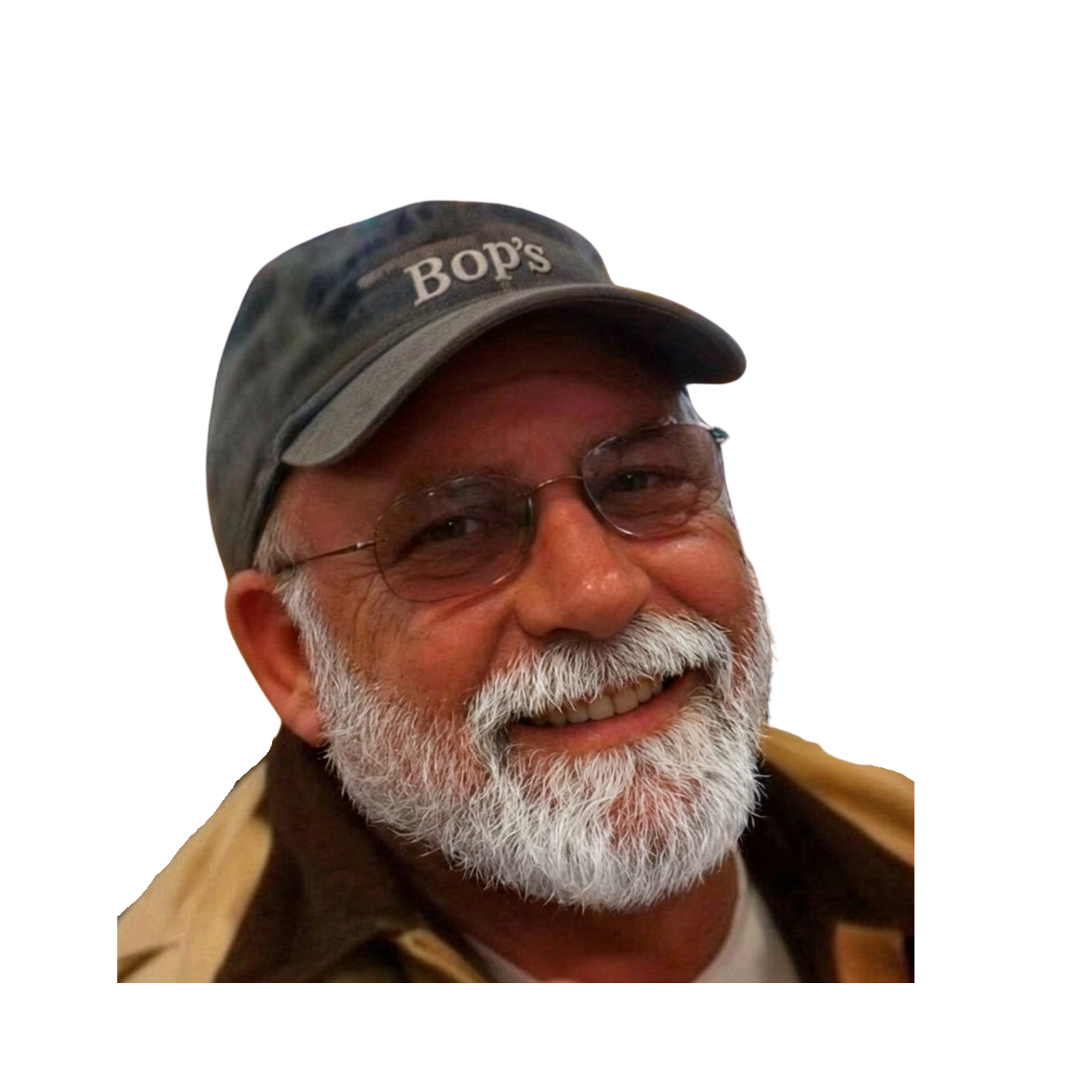 Close-up of an older man wearing glasses, a beige jacket, and a baseball cap with the name "BOP'S" written on it.