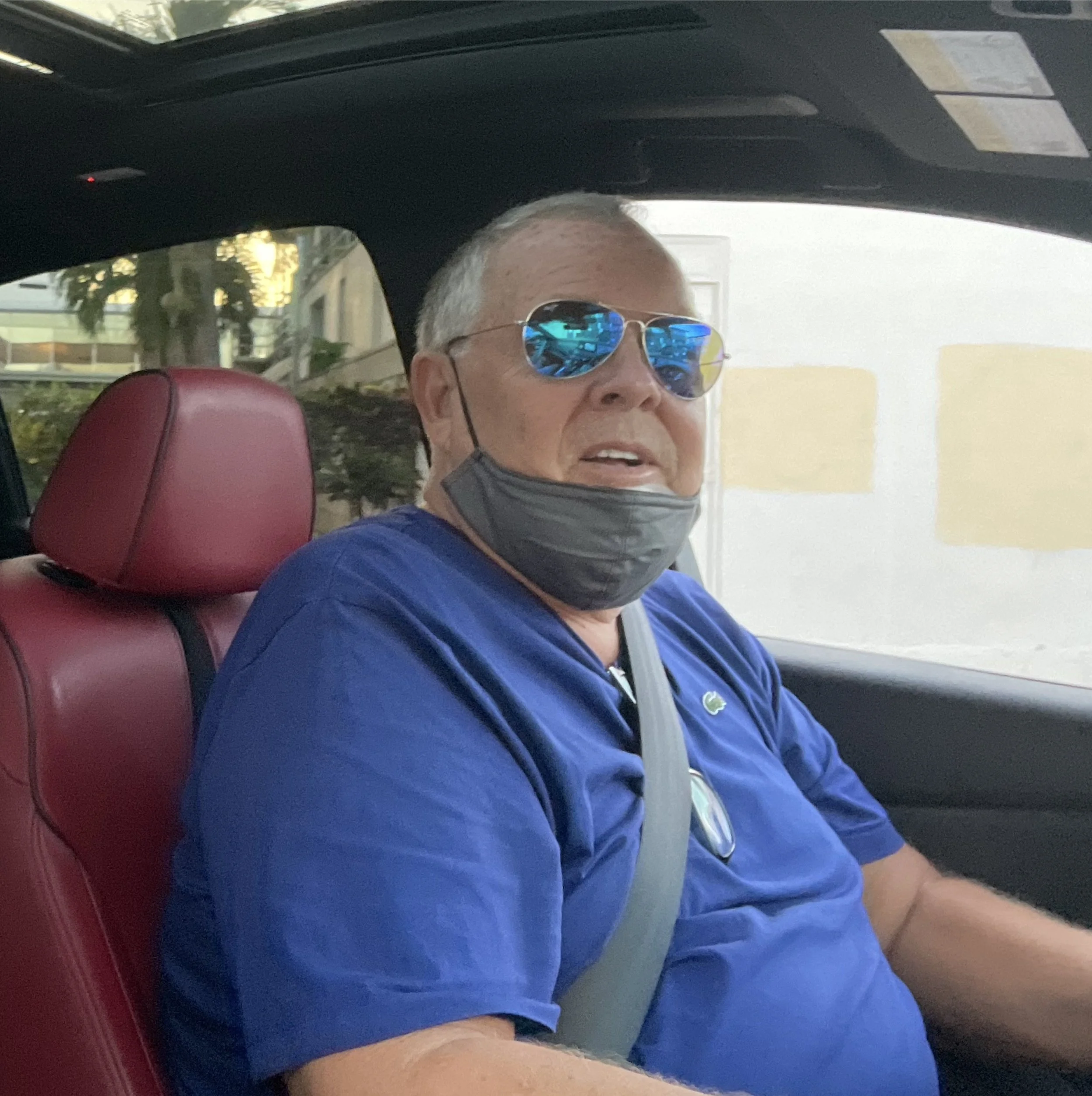 Marty Bryant born 12-6-1952 CON ARTIST of Irvine California sitting in his car in Oahu Hawaii