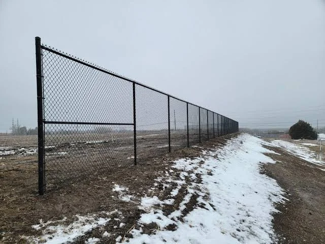 Black commercial chainlink fencing in Colorado Springs by Paragon Fence Co