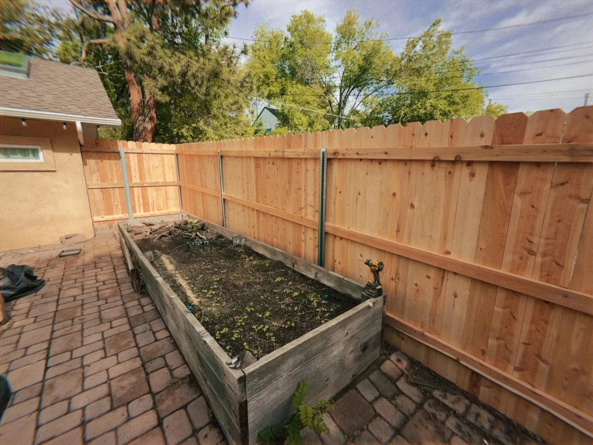 Cedar picket fence steel post