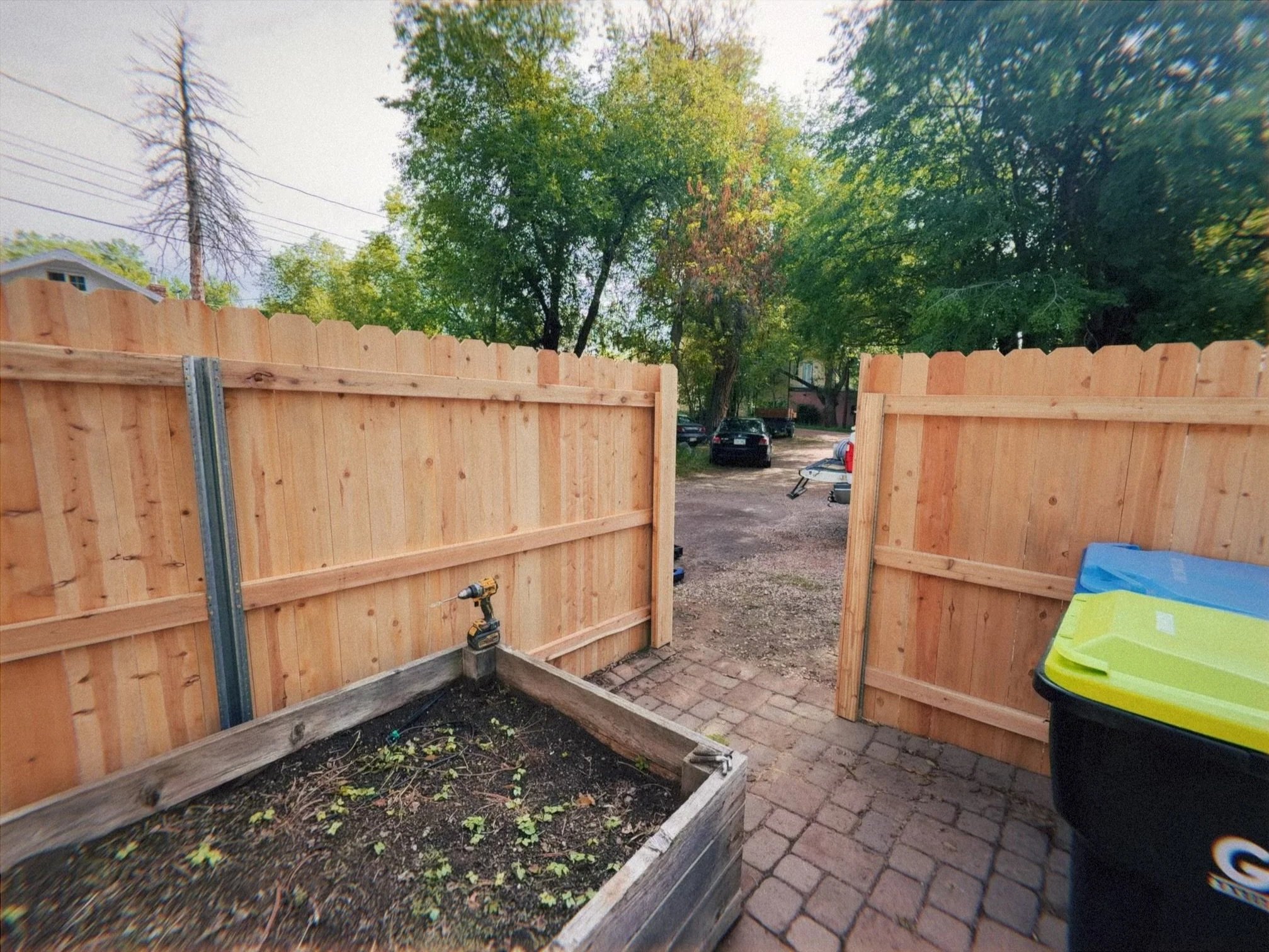 Cedar picket fence steel post gate