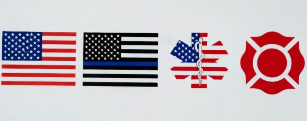 Four different flag designs, including a traditional American flag, thin blue line for law enforcement, EMS, and a red firefighter emblem.