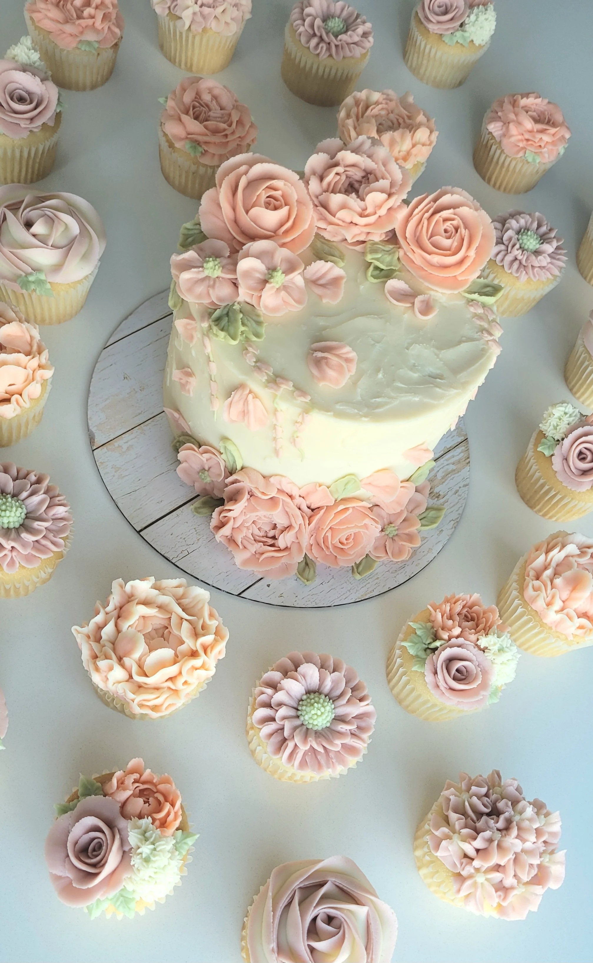 Floral buttercream cake and cupcakes for bridal shower Ottawa
