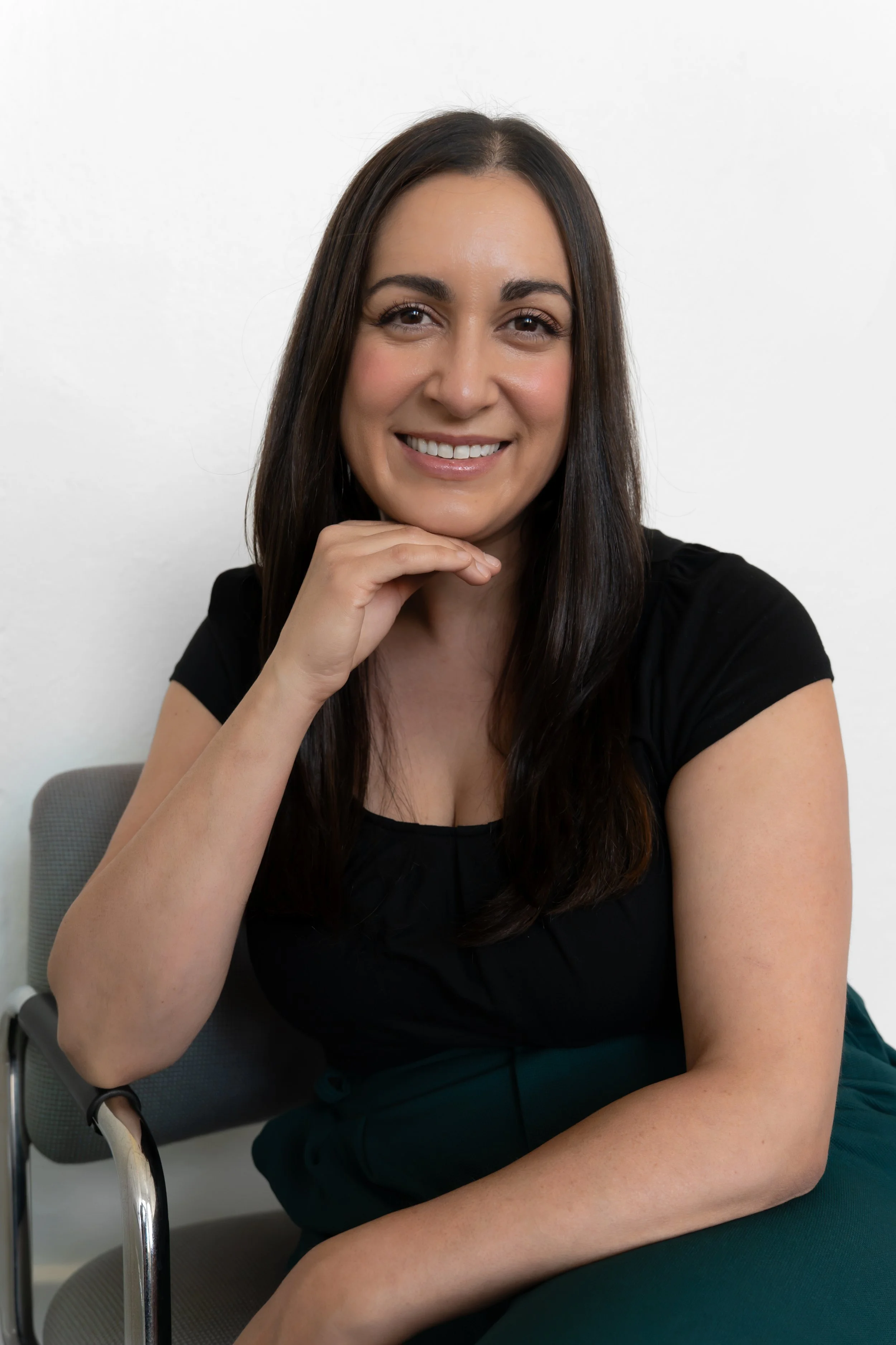A professional headshot of Leila Bighash Tracey
