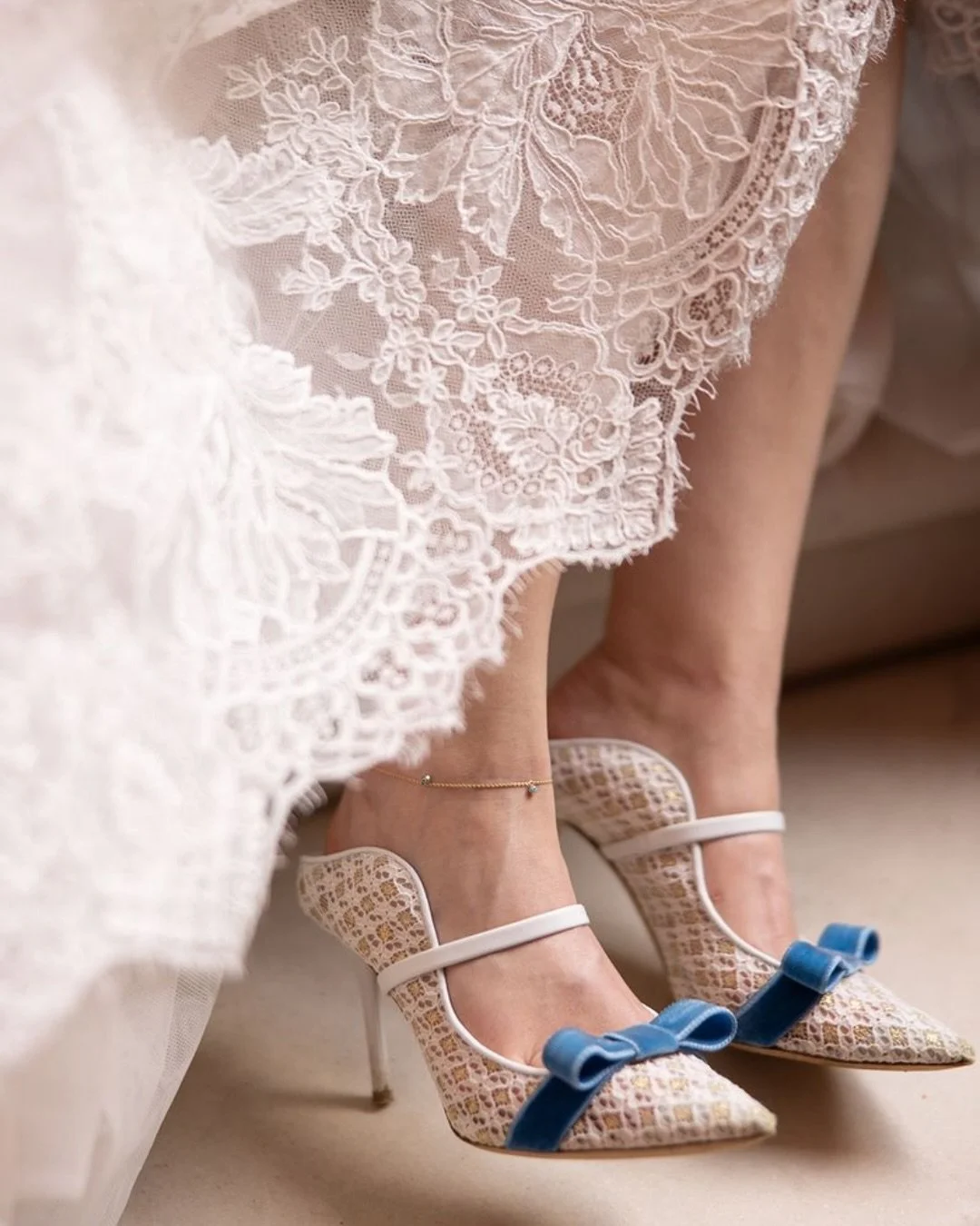 The Detail That Made It: The Shoes.

Tell me: beautiful shoes or dancing shoes? I have opinions.
I love a beautiful wedding shoe.

I love a wedding shoe that tells me something about the bride even more.
Because the little details are where personali