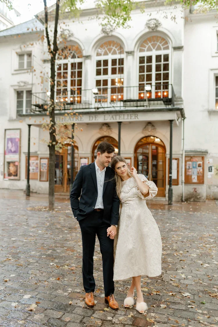 Bride and Groom on the Cobblestone Streets of Paris at their Luxury Destination Wedding Planned by Faith Ferguson Productions