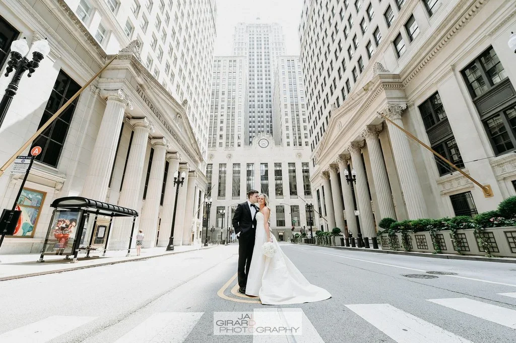 Bride and Groom on Street at their Chicago Destination Wedding Planned by Faith Ferguson Productions