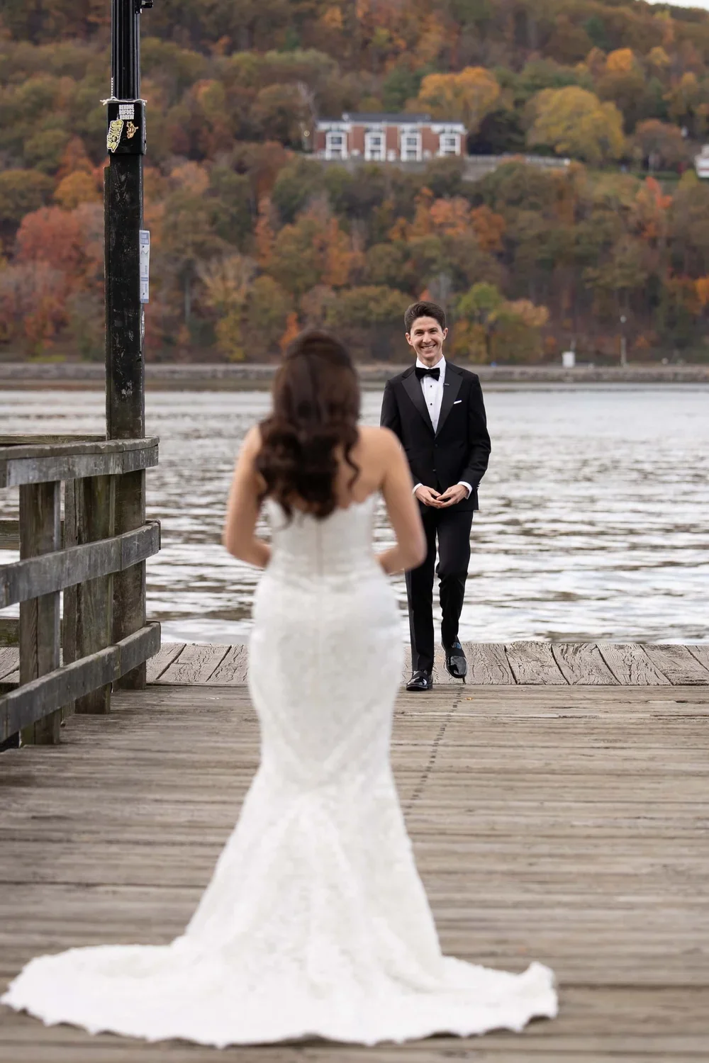 Couple Outdoors By Hudson River at their  Luxury Destination Wedding Planned by Faith Ferguson Productions