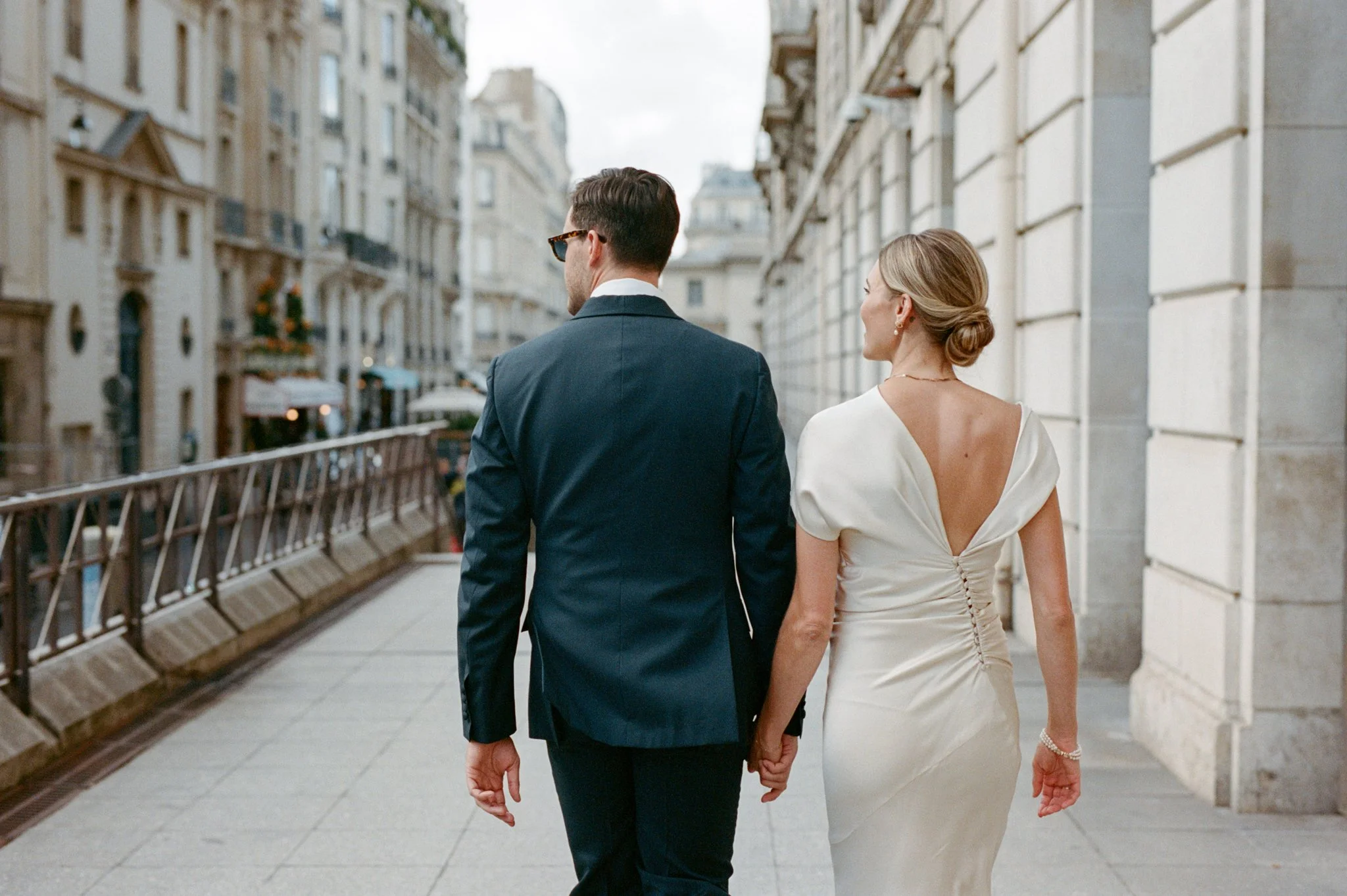 Bride and Groom on the Streets of Paris at their Luxury Destination Wedding Planned by Faith Ferguson Productions
