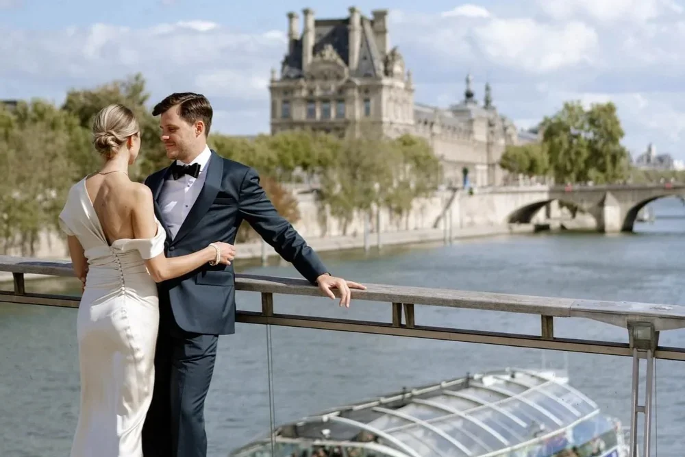 Bride and Groom on a Bridge at their Luxury Destination Wedding in Paris Planned by Faith Ferguson Productions