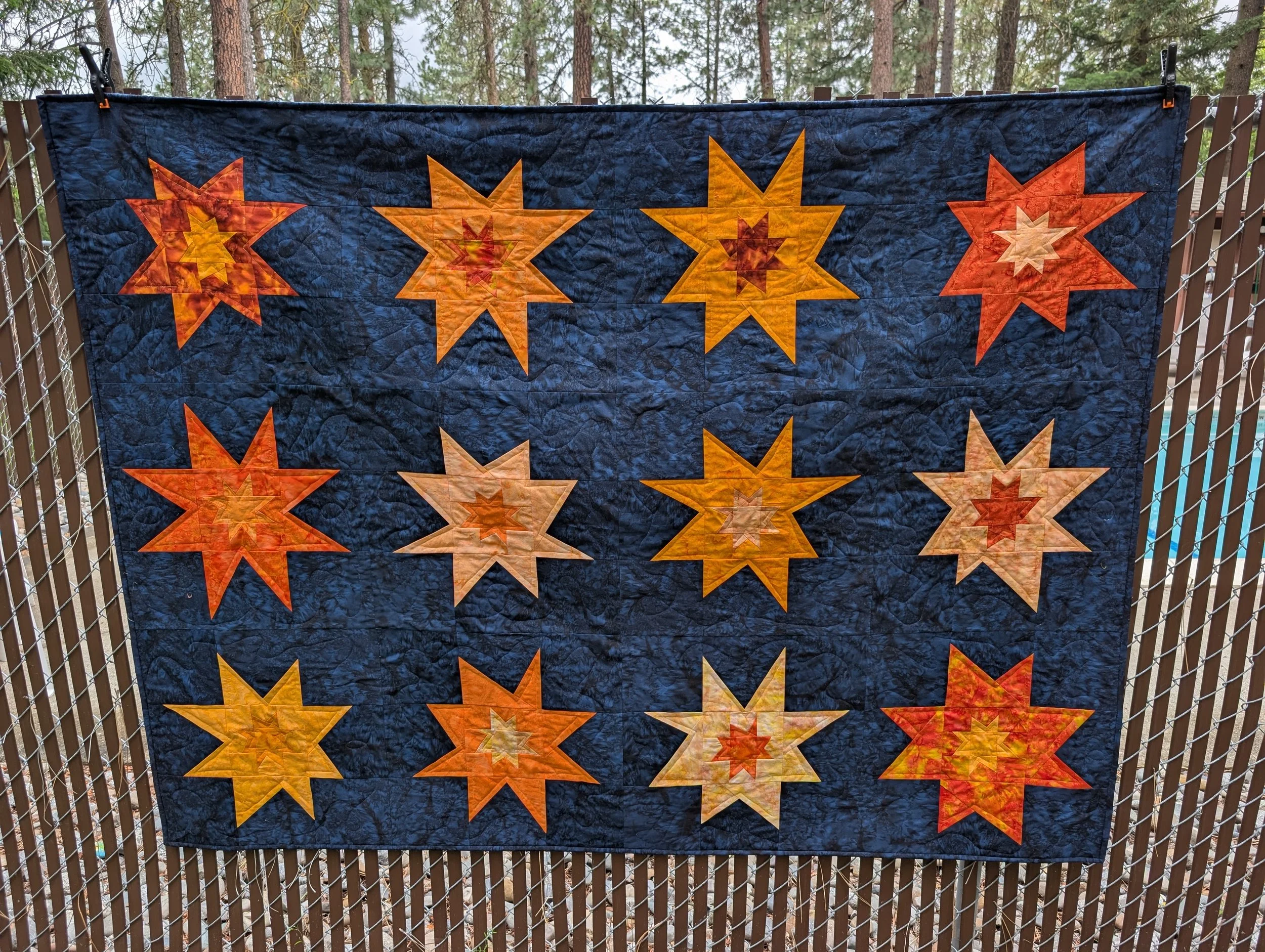 The second @blacklinequiltstudio announced this pattern, I was hooked. The inspiration&mdash;a little girl named Izot looking up at a crystal-clear, star-filled night sky&mdash;instantly sparked an idea. I wanted every single star to be unique, from 