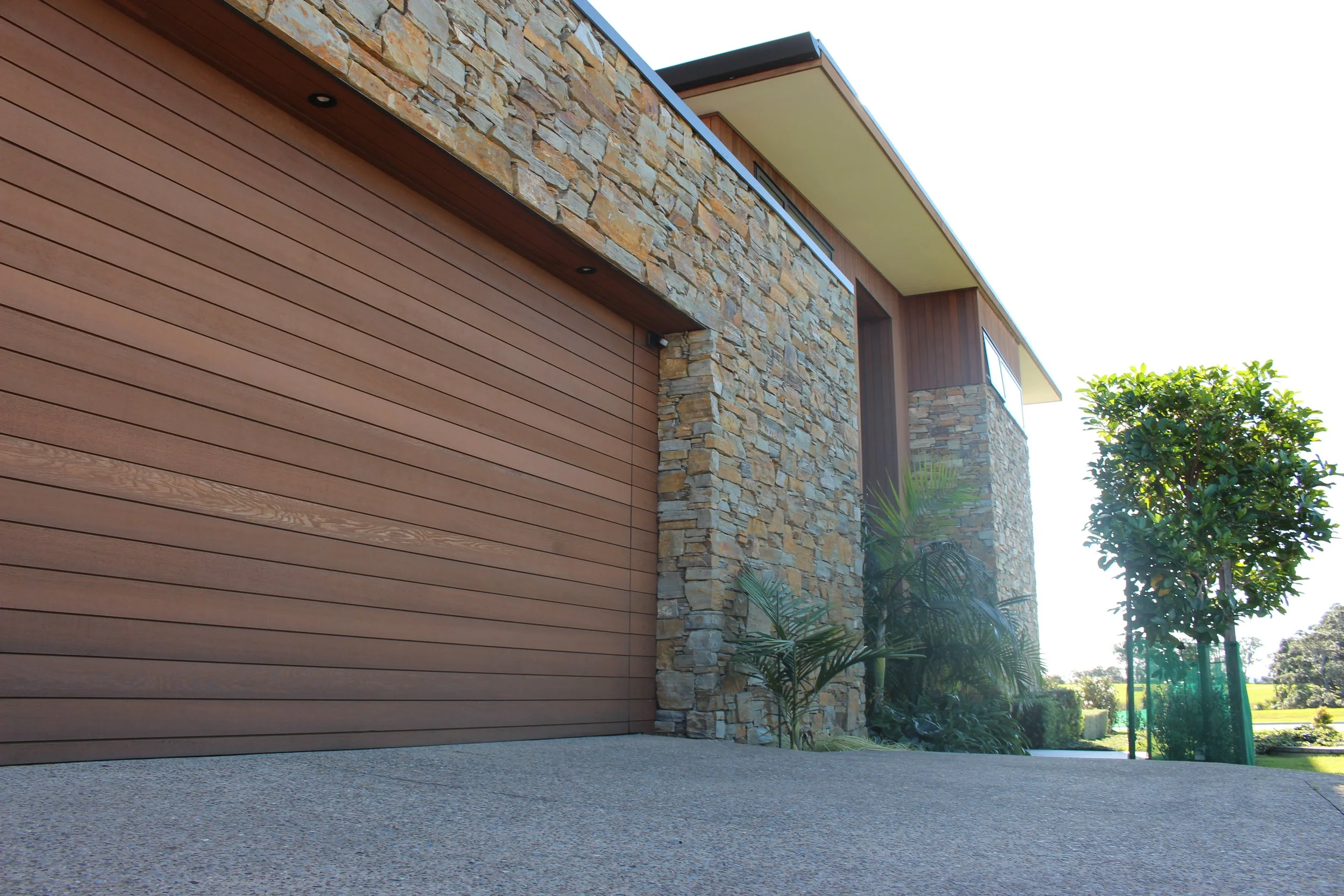 Garage and stone cladding