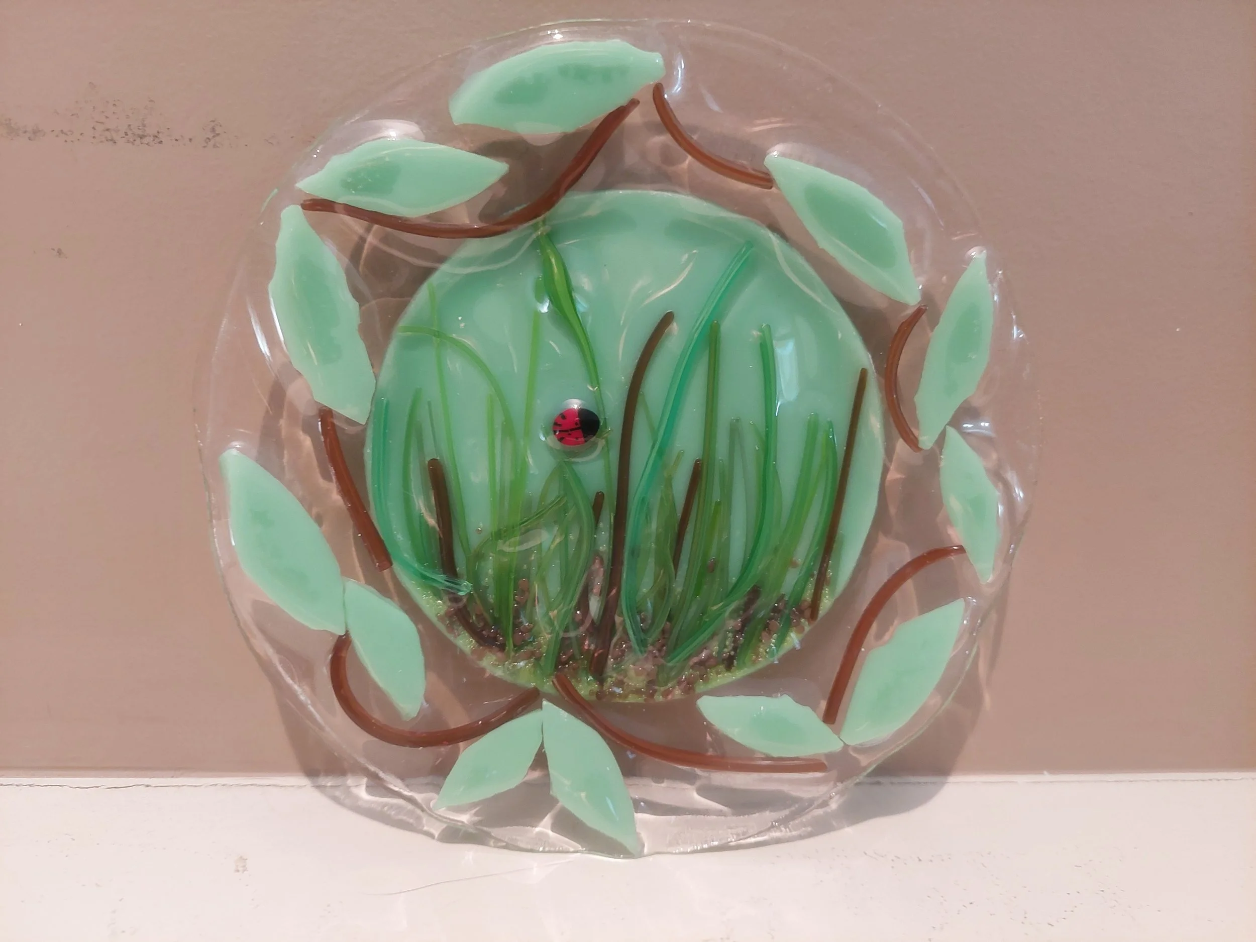 Ladybug in Grass fused glass plate