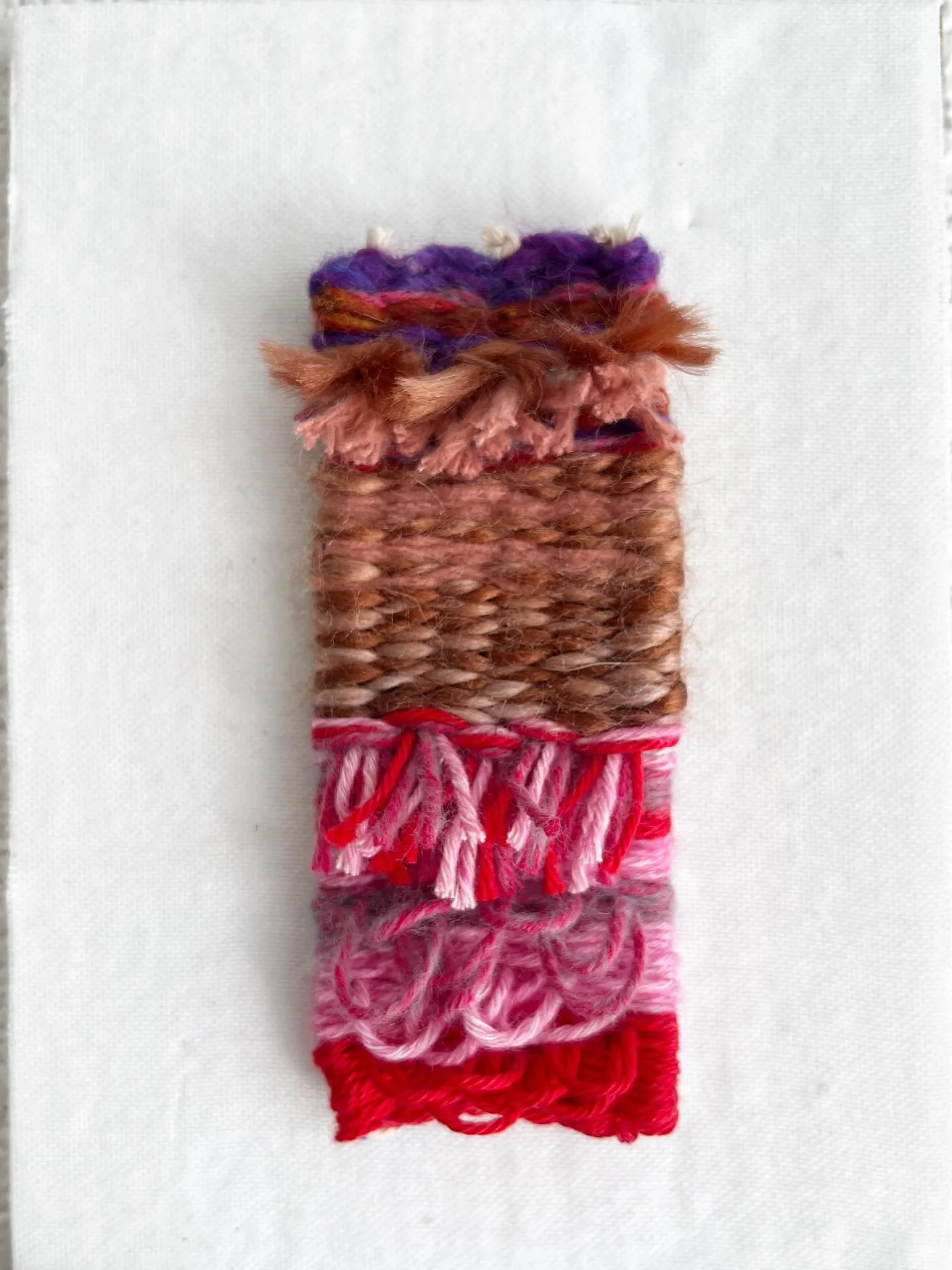 Finally finished and available now at the store 432 Broadway St, HSNP
Tiny weaving with tiny rya knots and loops in shades of corals, pinks, and purples ➰💜🩷 
Roughly 4.5x2 inches and comes with a 5x7 shadow box frame
$25 comes framed

#arkansasarti