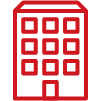 Red building with multiple windows and a central entrance