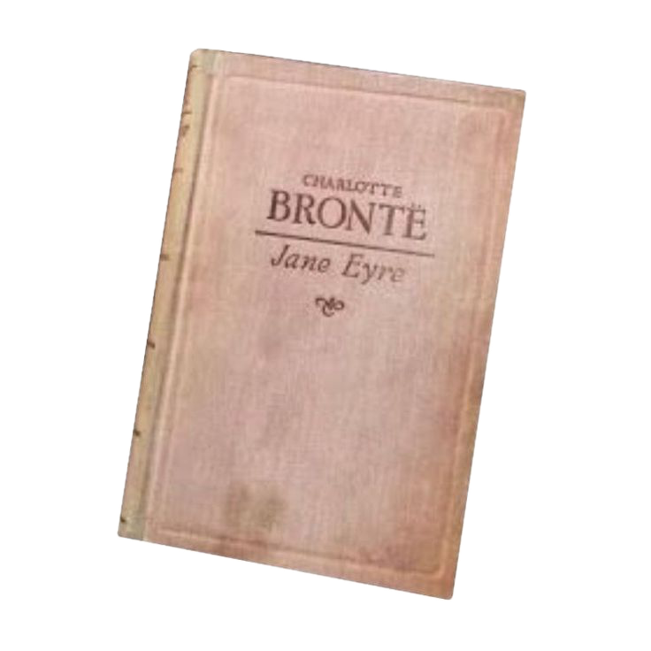A worn, pinkish paperback book titled "Jane Eyre" by Charlotte Bronte.