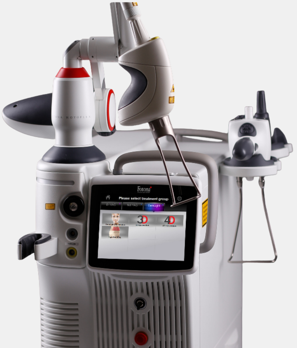 Medical laser machine with a digital display screen and various attachments, used for dermatological or cosmetic treatments.