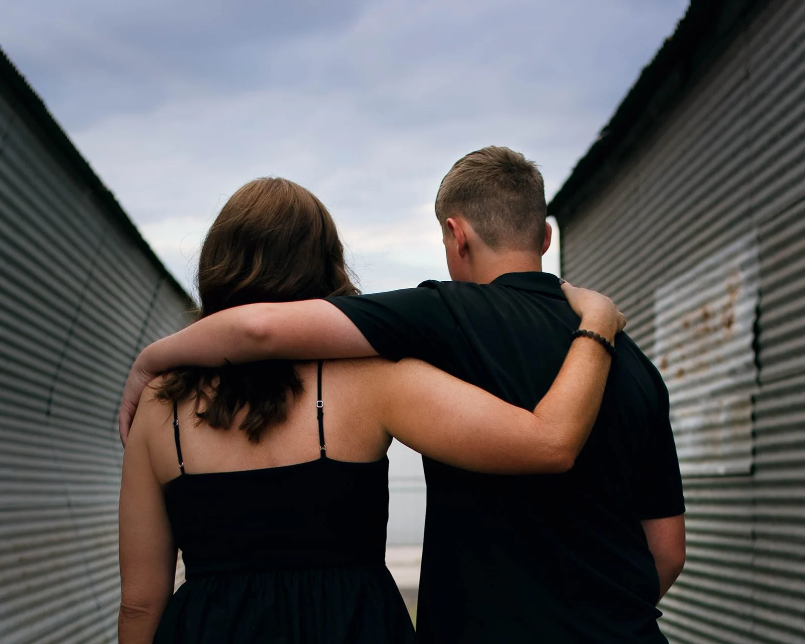 mother and son with arms around shoulders