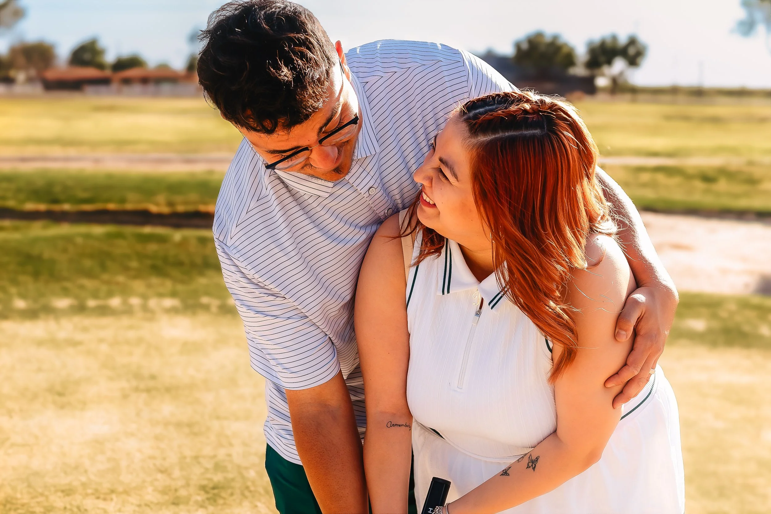 couple playing golf