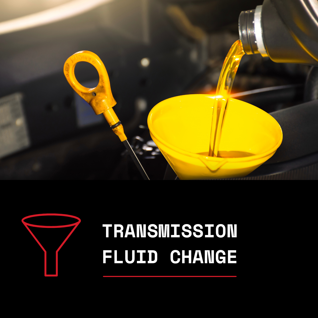 Pouring transmission fluid into a yellow container beneath a vehicle, with a dipstick nearby and a sign indicating "Transmission Fluid Change."