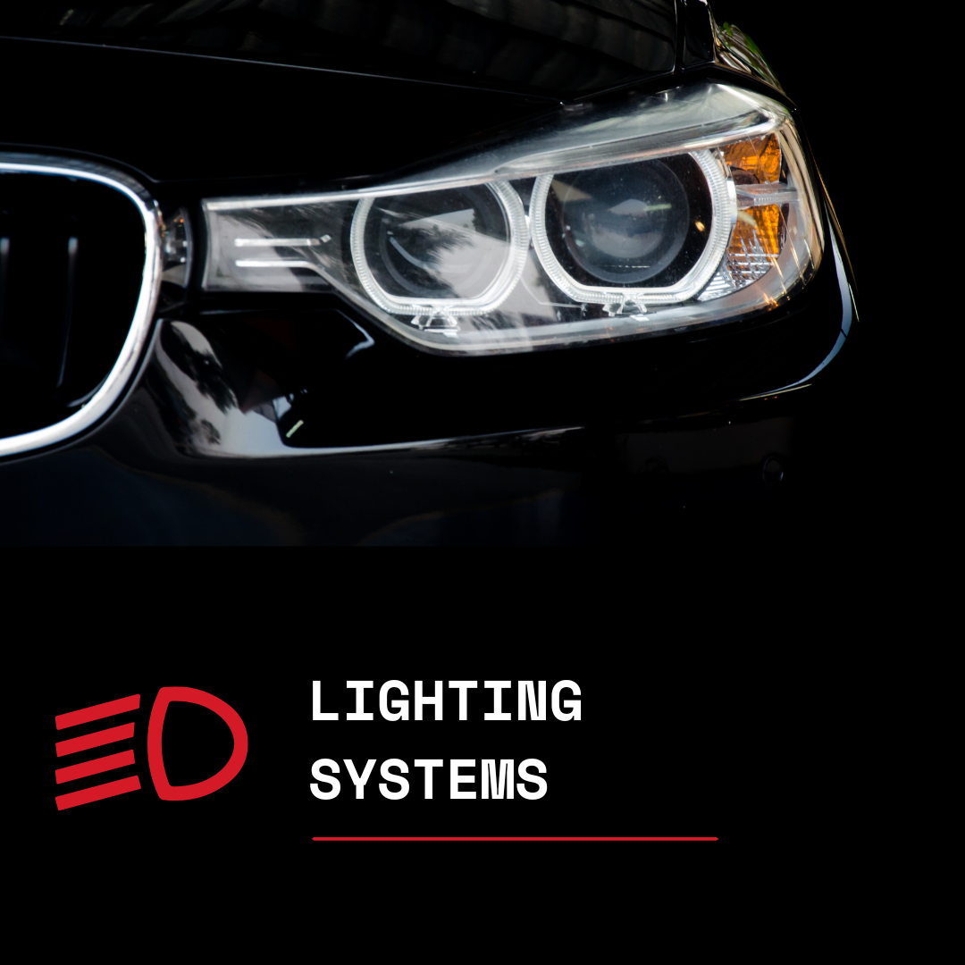 Close-up of a black car's headlight with a sign below it that says 'Lighting Systems' and has a red icon of a headlight.