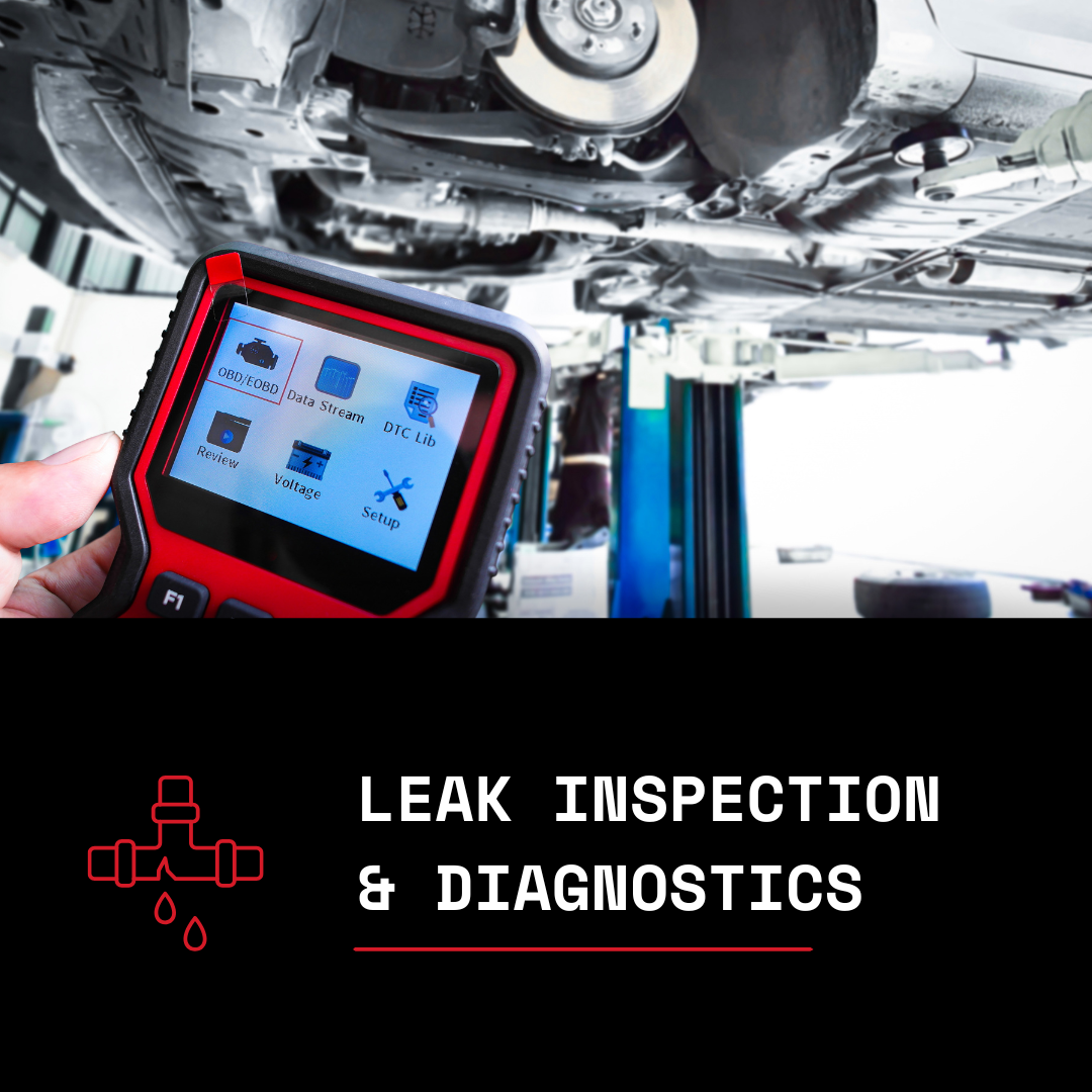 A mechanic uses a diagnostic scanner to inspect a vehicle lifted on a hydraulic lift, with the underside of the car visible.