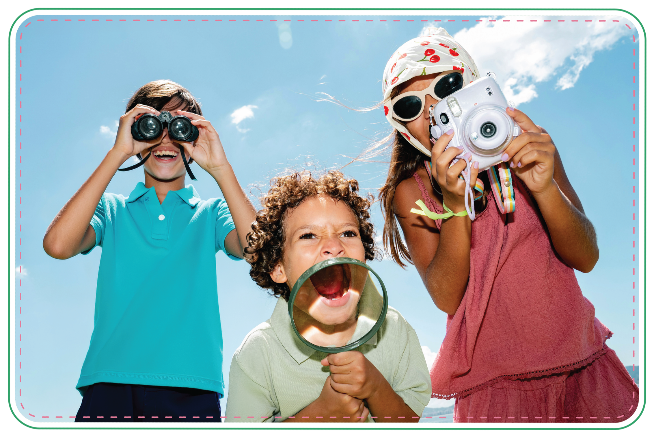 Three children outdoors under a blue sky, with two wearing sunglasses, one with a sunhat, and one holding a magnifying glass, all looking towards the camera.
