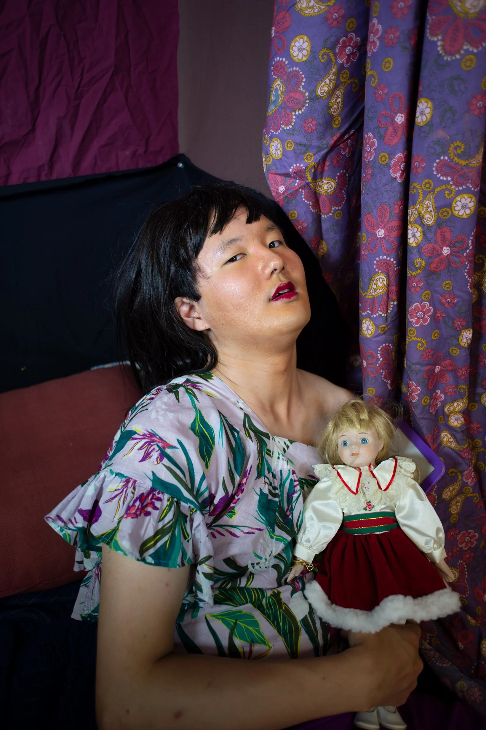 "Gender Fluid Mimetic Fantasy 011" or "Playing with a Doll," Taken by Haley Indorato (2021). Medium: Digital Photography. Dimensions: Variable.