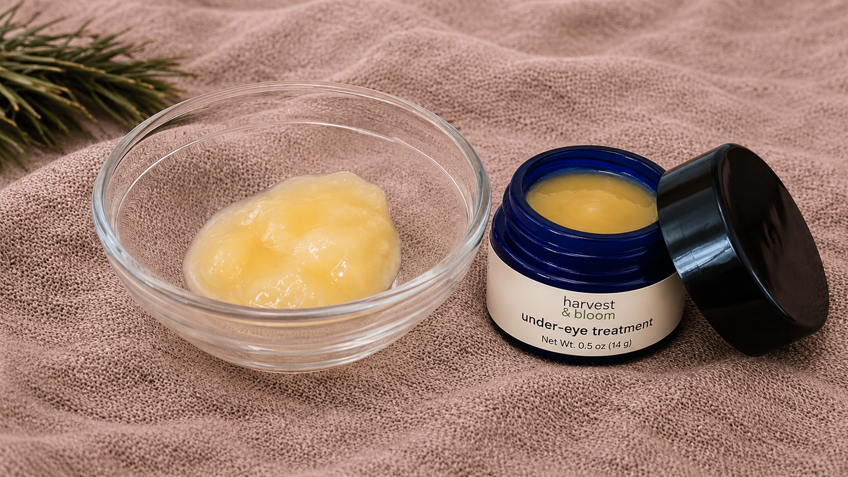 A close-up view highlighting the dense, silky, and cushiony texture of a waterless plant-butter-based eye treatment balm.