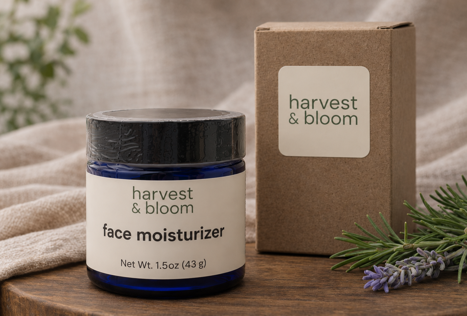 A 1.5-ounce jar of botanical face cream standing on a wooden platter next to its minimalist kraft paper product packaging box.