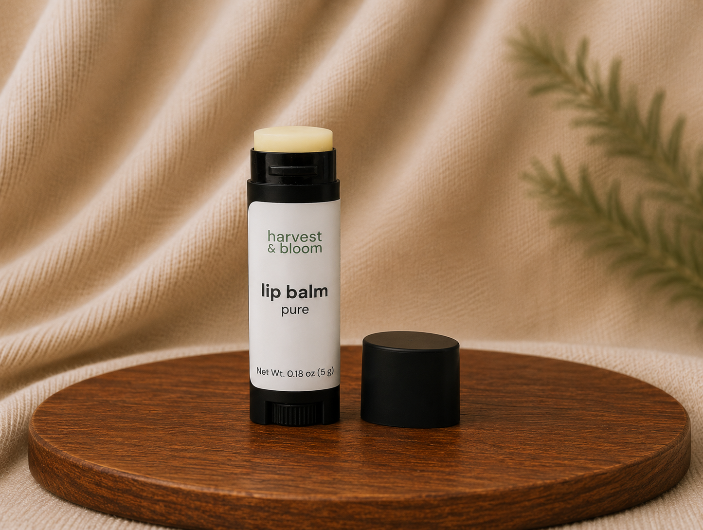 An open tube of Pure unscented natural lip balm with its black cap off, highlighting a smooth, creamy plant-butter-based formula.