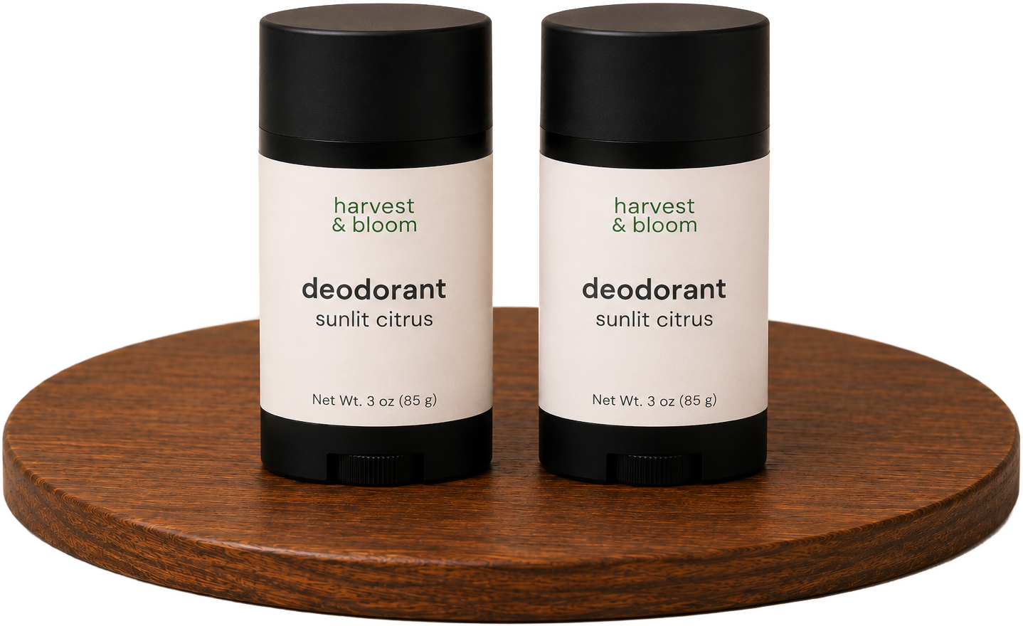 Shop the Harvest and Bloom natural deodorant duo set featuring a two-pack of aluminum and baking-soda-free sticks on a wooden tray.