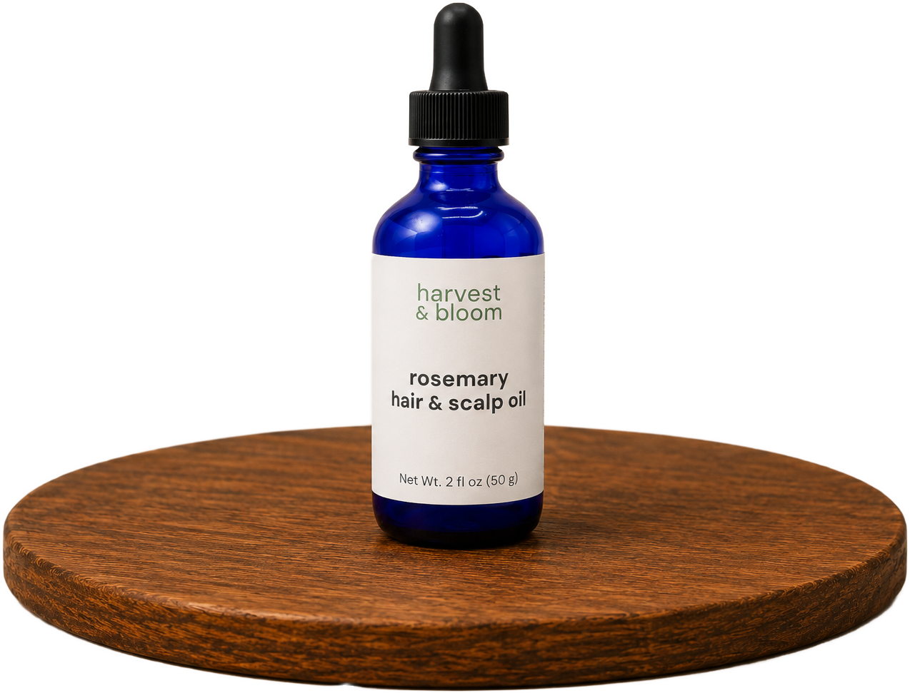Shop Harvest and Bloom rosemary hair and scalp oil collection bottles slow-infused with fresh botanicals.