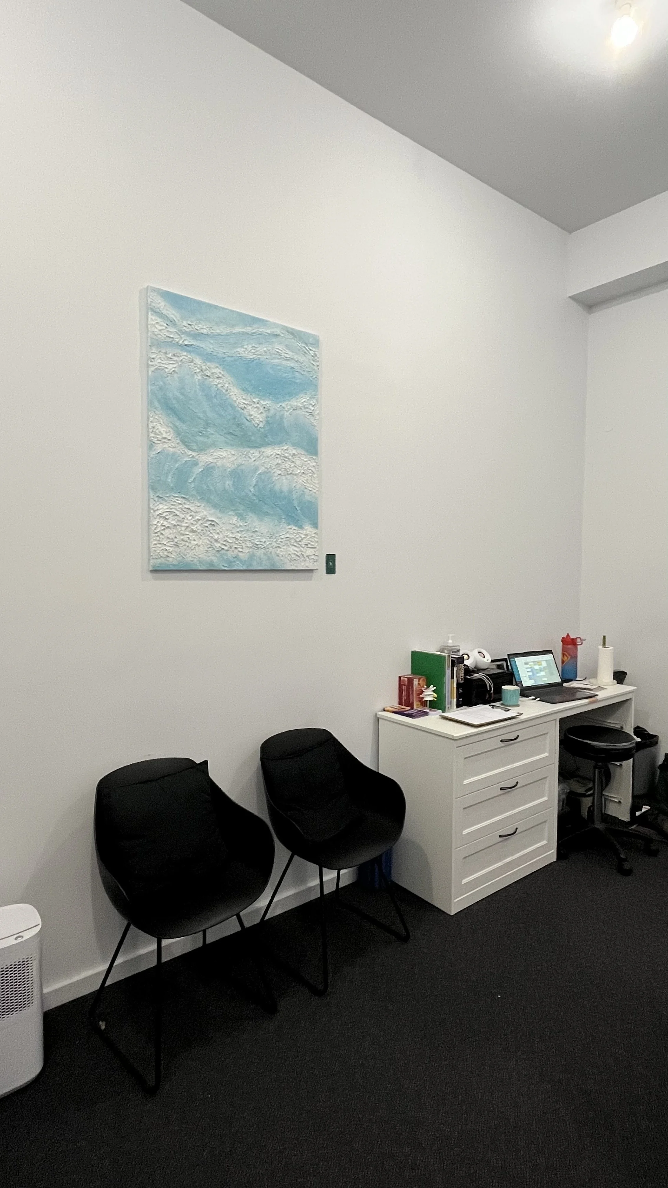 painting on the wall in medical office