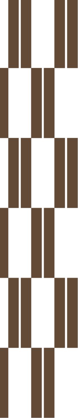 A pattern of vertical and horizontal wooden planks arranged in a repeating geometric design.