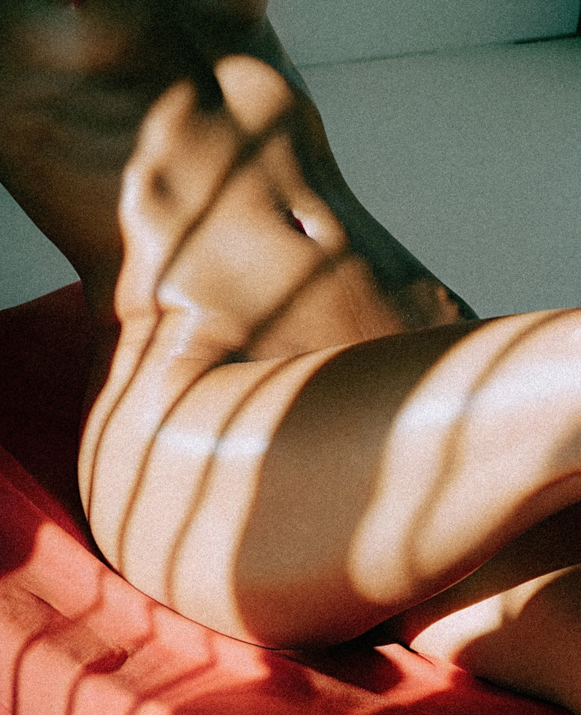 Muscular woman on towel