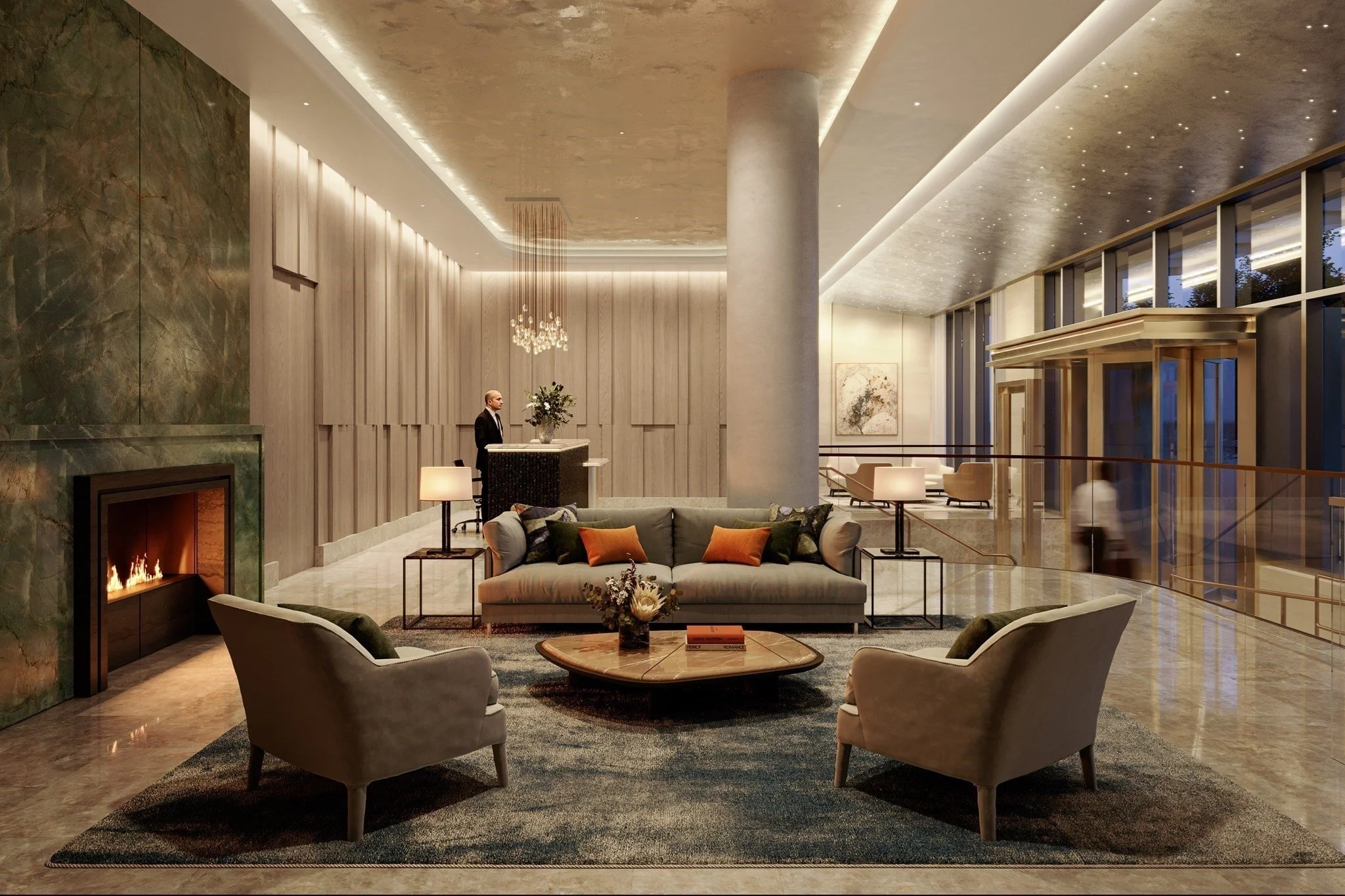 Luxury hotel lobby with fireplace, chandelier, reception desk, modern seating, and glass elevator.