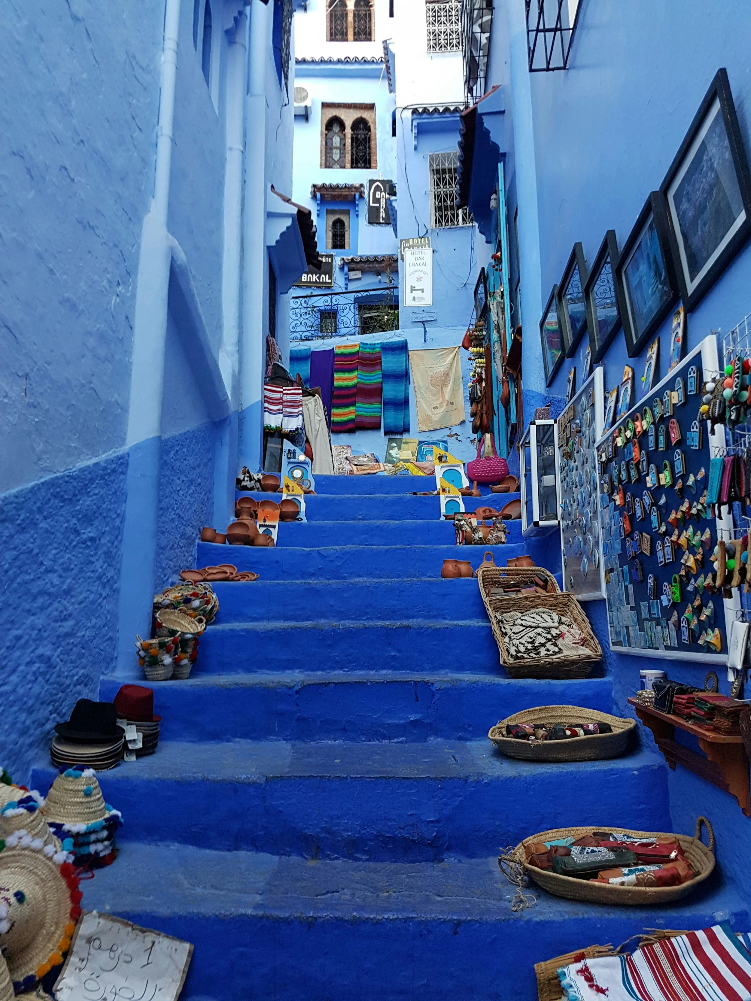 Morocco Vistas | Moorish & Andalusian Heritage — blue-painted stairway market alley, Chefchaouen