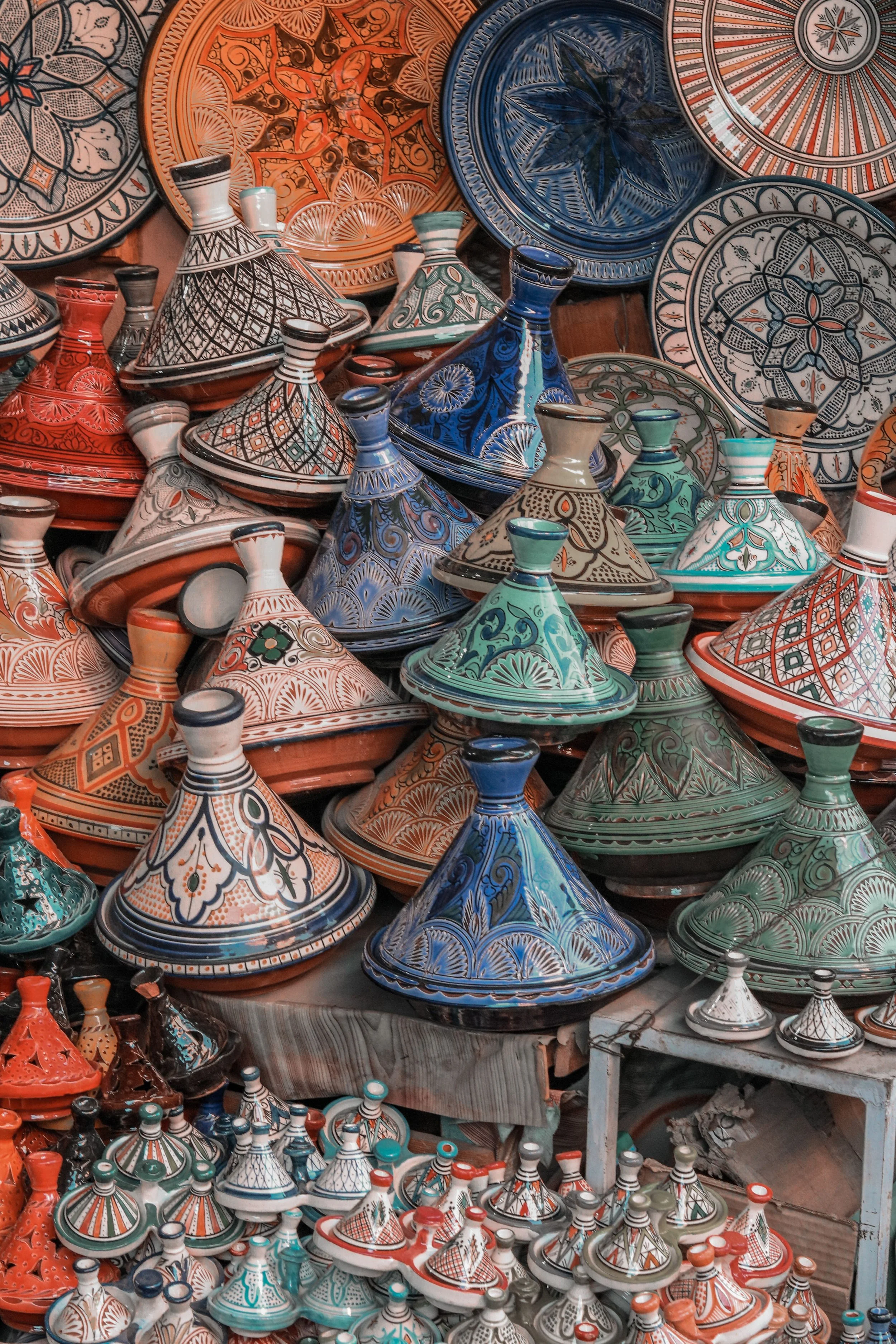 Morocco Vistas | Moorish & Andalusian Heritage — colorful ceramic tagine pottery, traditional Moroccan souk