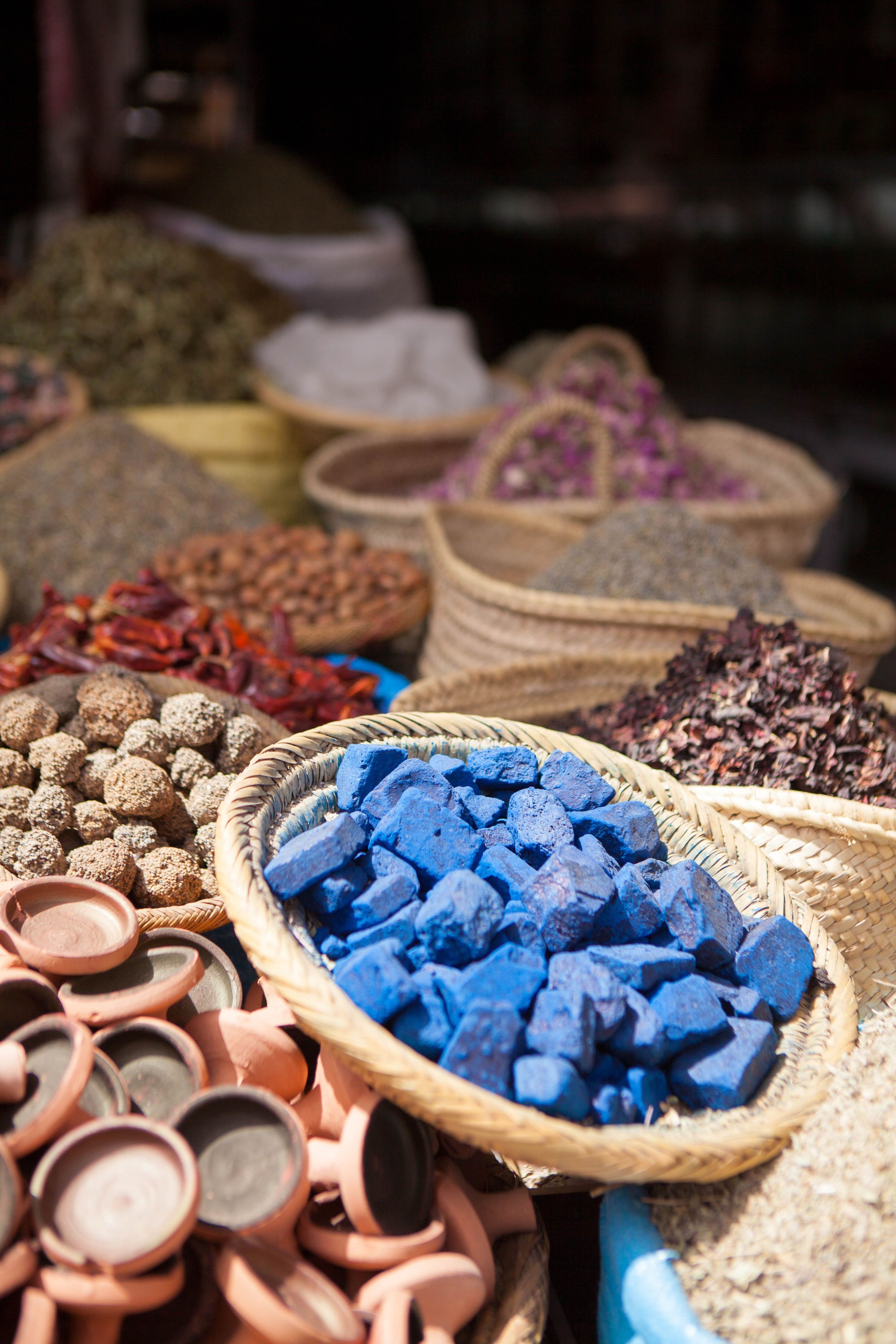 Morocco Vistas | Moorish & Andalusian Heritage — indigo dye and traditional pottery, artisan souk, Marrakech medina