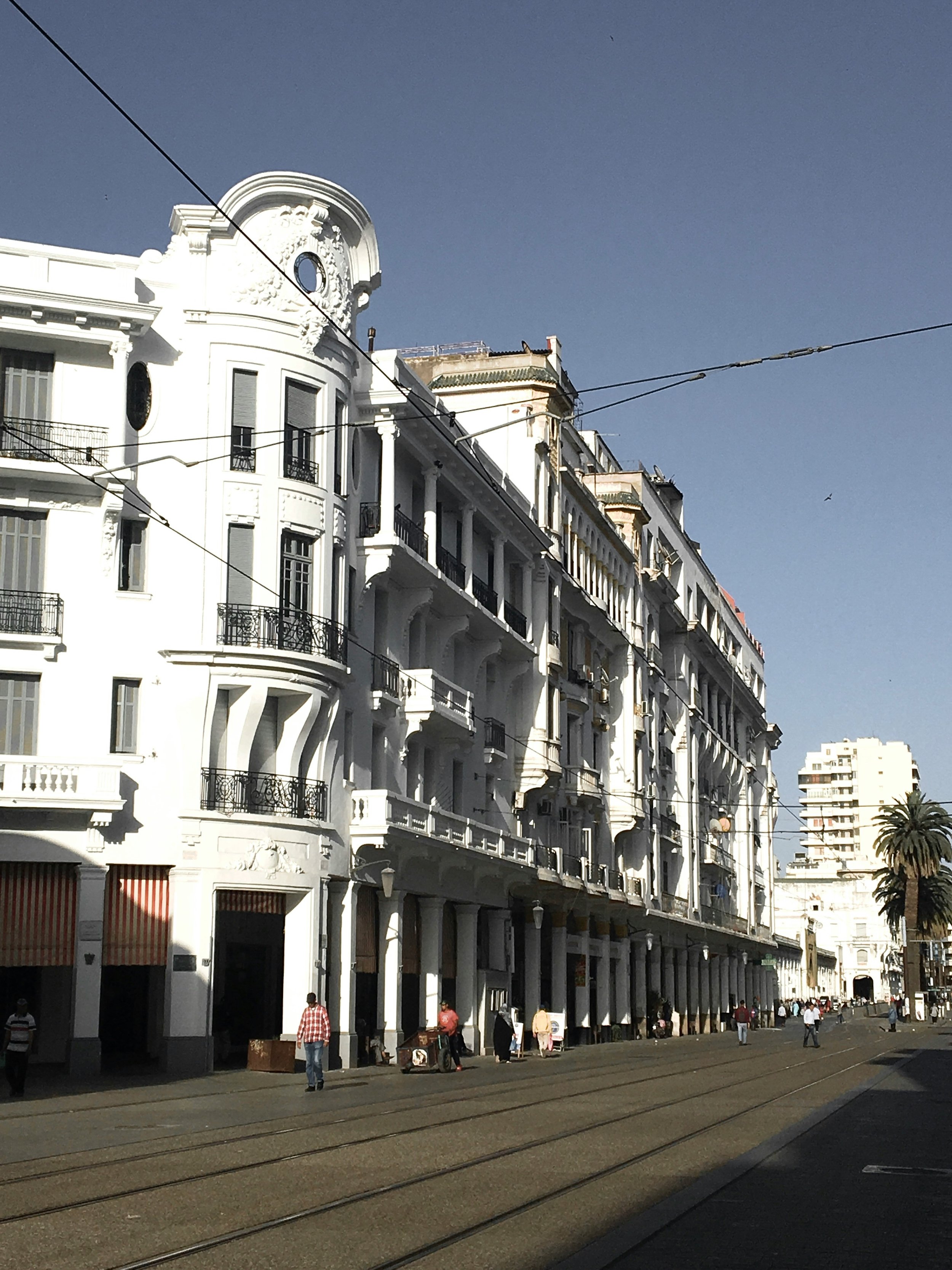 Morocco Vistas | Moorish & Andalusian Heritage — colonial-era architecture and tram tracks, downtown Casablanca